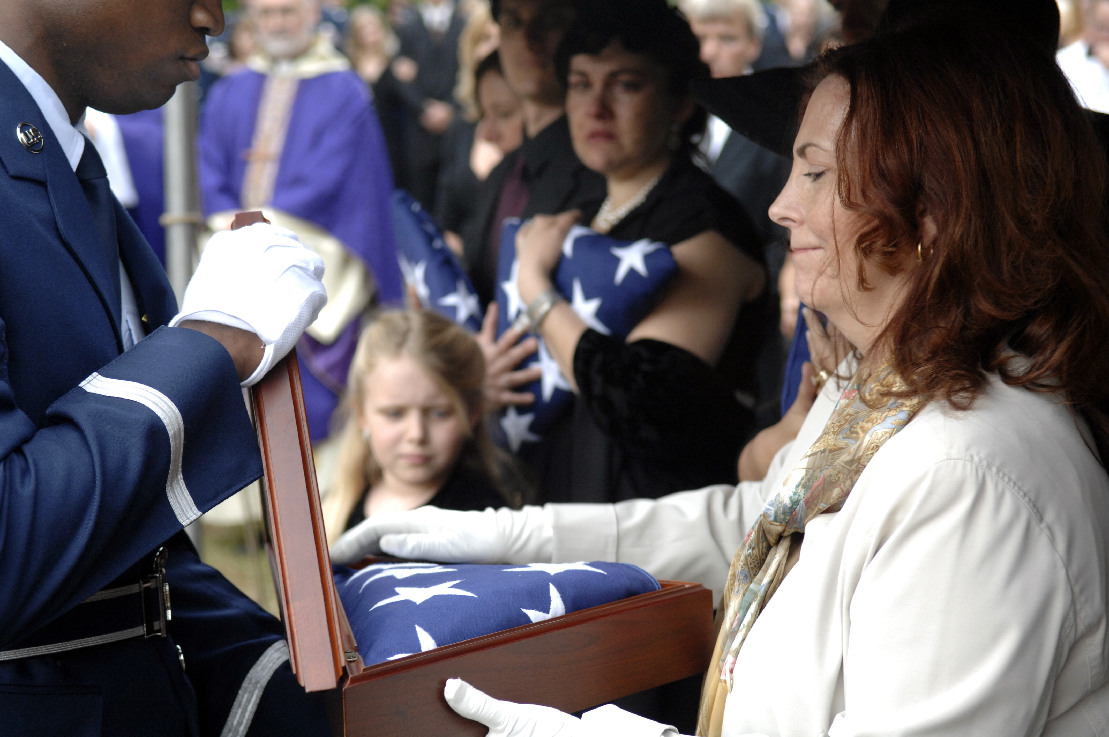 military honor guard funeral flag presentation