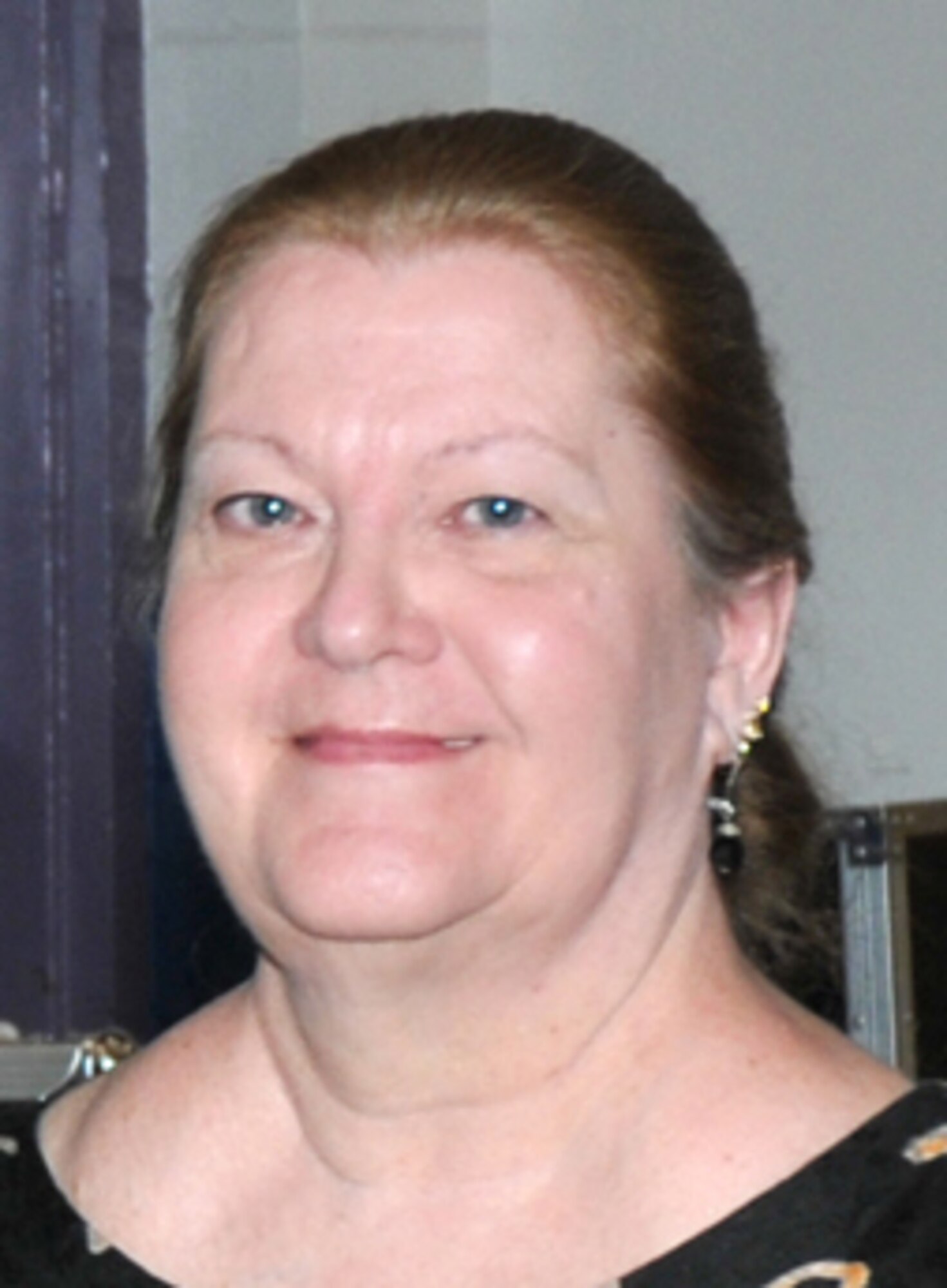 Mrs. Marilyn Reid was honored for her accomplishments at Keesler’s annual volunteer awards ceremony April 20.  Mrs. Reid manages Airman’s Attic, a project that offers household and clothing items for Keesler Airmen.  (U.S. Air Force photo by Adam Bond)
