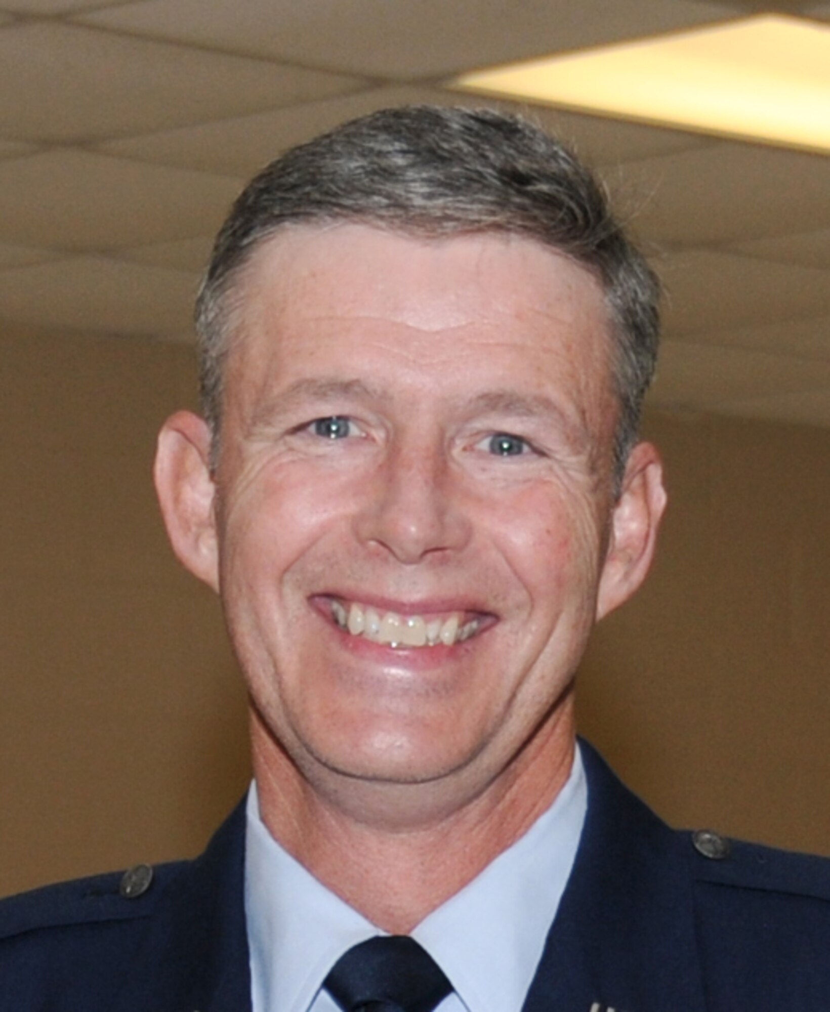 Biloxi Mayor A. J. Holloway and Brig. Gen. Ian Dickinson, 81st Training Wing commander, presented Chaplain (Maj.) Henry Close an award for the military volunteer of the year at Biloxi’s 27th annual Biloxi Volunteers Awards ceremony April 21.  (U.S. Air Force photo by Kemberly Groue)