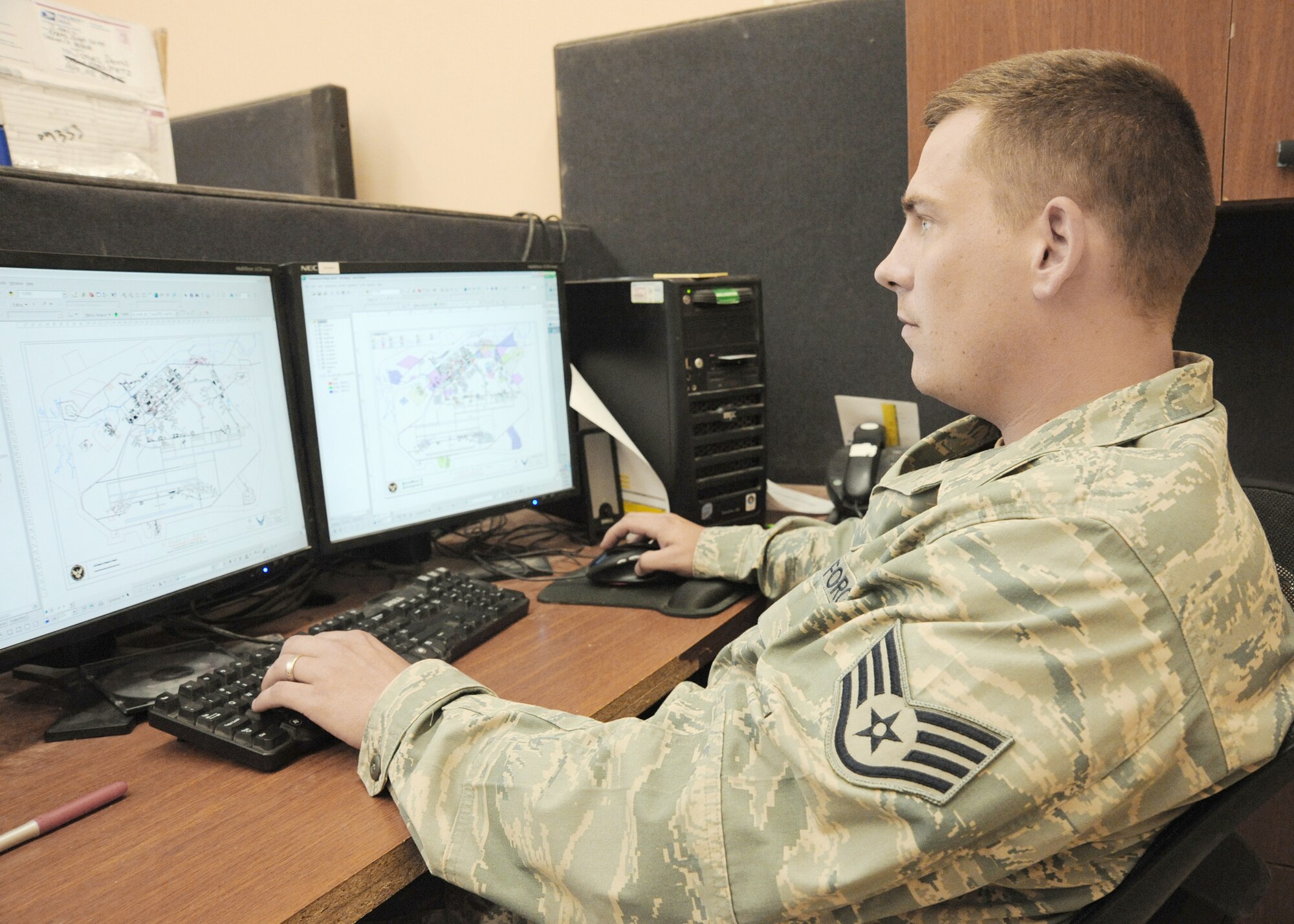 Staff Sgt. Dennis Jones creates maps for key leadership April 19, 2010, at Al Asad Air Base, Iraq. Sergeant Jones is an expeditionary geographic information officer for 732nd Expeditionary Prime Beef Squadron. (U.S. Air Force photo/Master Sgt. Trish Bunting)