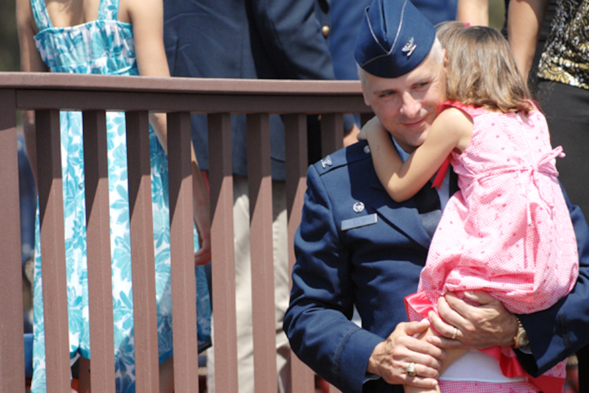 VANDENBERG AIR FORCE BASE, Calif. –Col. Richard Boltz, the 30th Space Wing commander, holds his daughter Adeline after assuming command of the 30th SW at a change-of-command ceremony held at the parade grounds here Monday, April 26, 2010. (U.S. Air Force photo/Senior Airman Christopher Hubenthal)