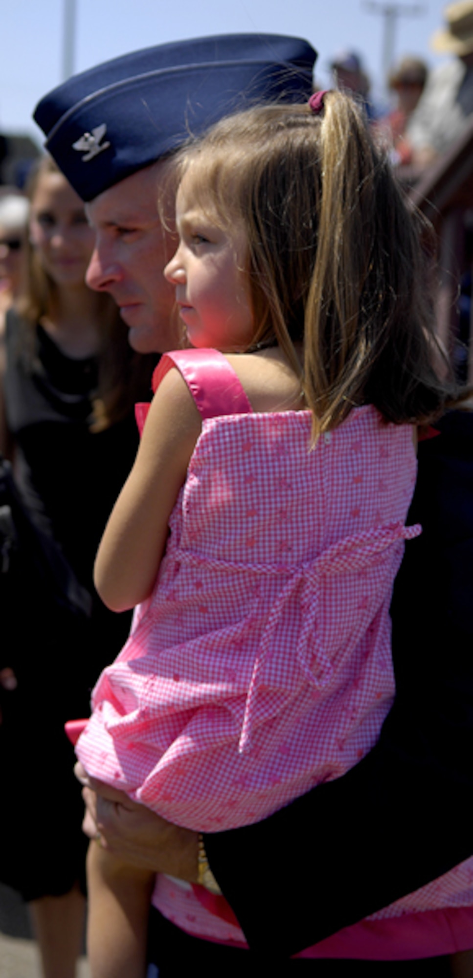 VANDENBERG AIR FORCE BASE, Calif. –Col. Richard Boltz, the 30th Space Wing commander, holds his daughter Adeline after assuming command of the 30th SW at a change-of-command ceremony held at the parade grounds here Monday, April 26, 2010. (U.S. Air Force photo/Airman 1st Class Andrew Lee)