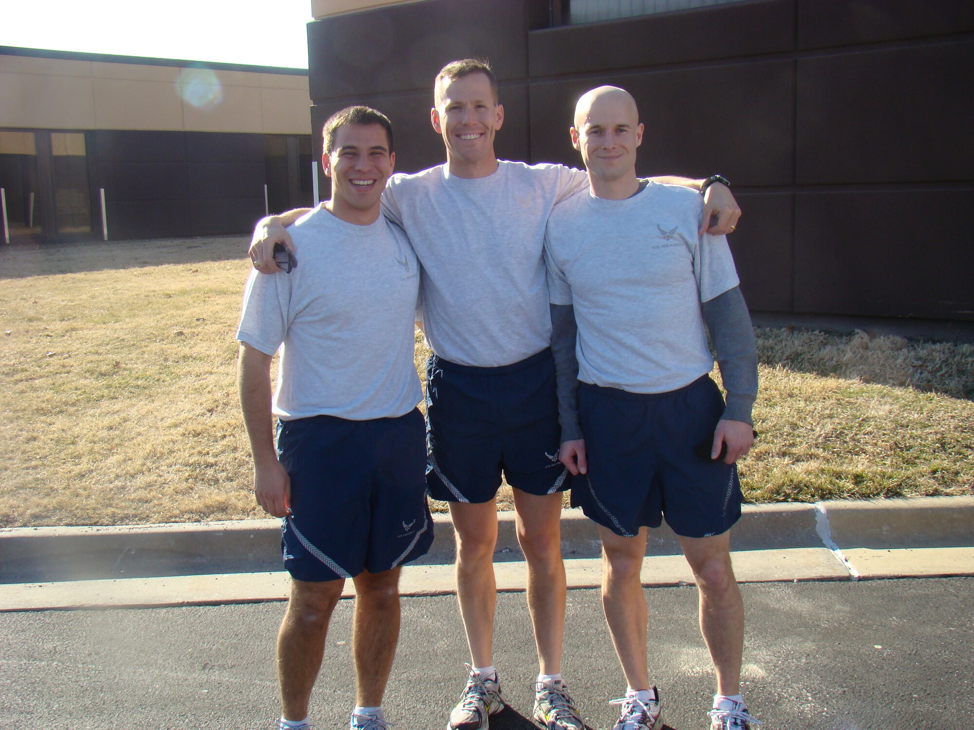SCOTT AIR FORCE BASE, Ill. -- First Lt. Keith Sanders, Lt. Col. Patrick Castle and 1st Lt. Dave Johnson, all from the 375th Bioenvironmental Engineering Flight, just before they take off on another long run while training for the Go! St. Louis Marathon. Colonel Castle helped train both lieutenants and each finished the marathon held April 10. Courtesy Photo 