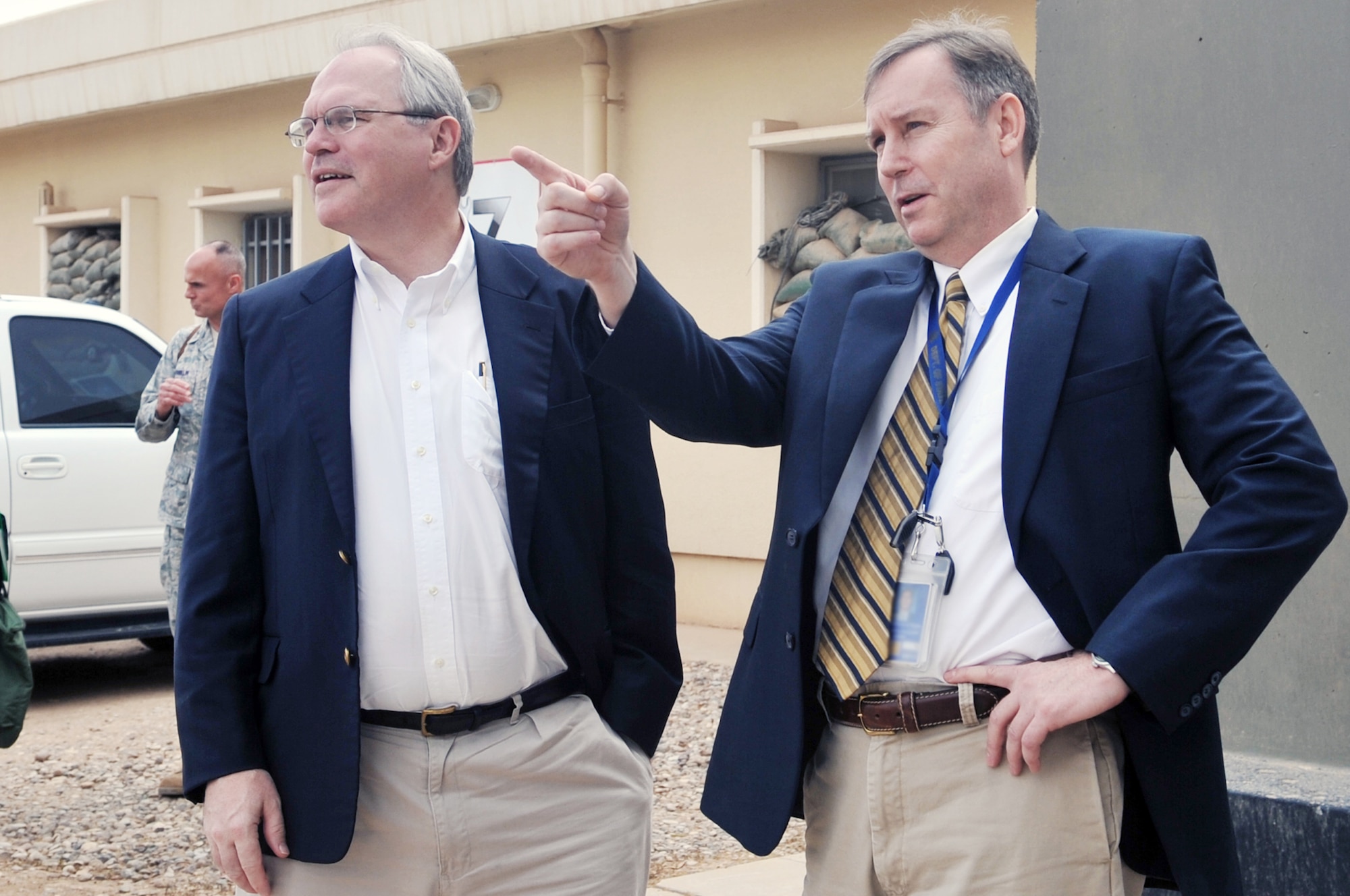 Ben Fluhart greets the U.S. Ambassador to Iraq Christopher Hill, during the ambassador's visit to the provincial reconstruction team April 23, 2010, at Joint Base Balad, Iraq. Mr. Fluhart is the Balad Provincial Reconstruction Team leader. (U.S. Air Force photo/Senior Airman Brittany Y. Bateman) 
