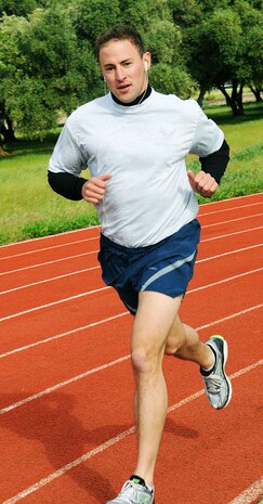 Capt. Brian Benestad, 9th Reconnaissance Wing assistant staff judge advocate, runs in the all ranks physical training challenge, April 28, at the track. The all ranks physical training challenge was a part of the Beale Cup, a series of games and challenges open to all squadrons and groups on base. (Air Force photo by Airman 1st Class Sandra Healy)