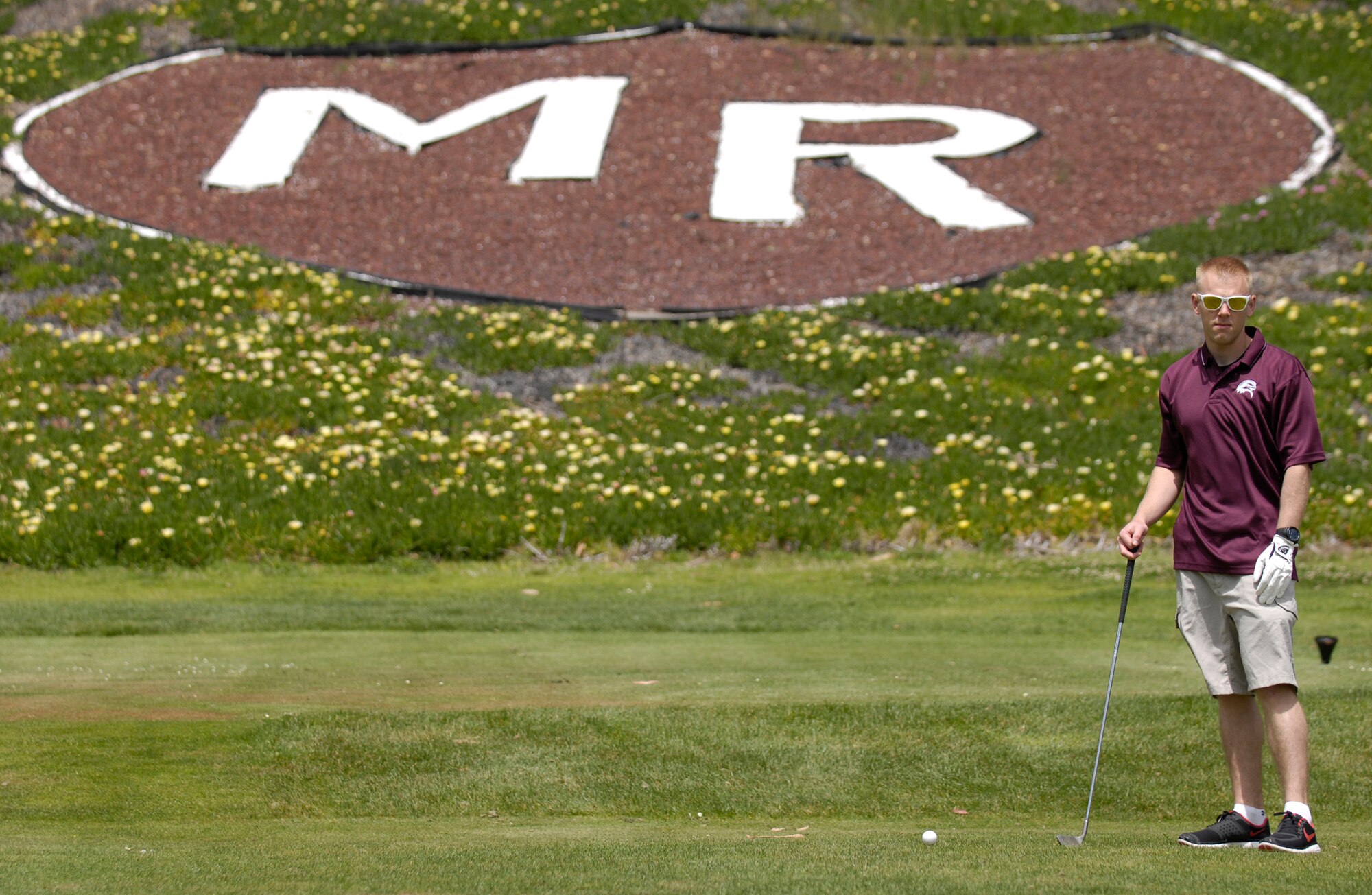 VANDENBERG AIR FORCE BASE, Calif. -- Senior Airman Josh Mauss, from the 30th Security Forces Squadron, waits patiently on the 11th hole before going to the next hole during the Guardian Challenge golf tournament at the Marshallia Ranch Golf Course here Friday, April 23, 2010.  (U.S. Air Force photo/Airman 1st Class Andrew Lee)
