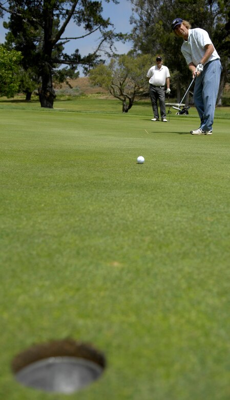 VANDENBERG AIR FORCE BASE, Calif. – Mr. Jeff Edwards, from the 30th Civil Engineer Squadron, putts his ball toward the hole during the Guardian Challenge golf tournament at the Marshallia Ranch Golf Course here Friday, April 23, 2010. (U.S. Air Force photo/Airman 1st Class Andrew Lee)