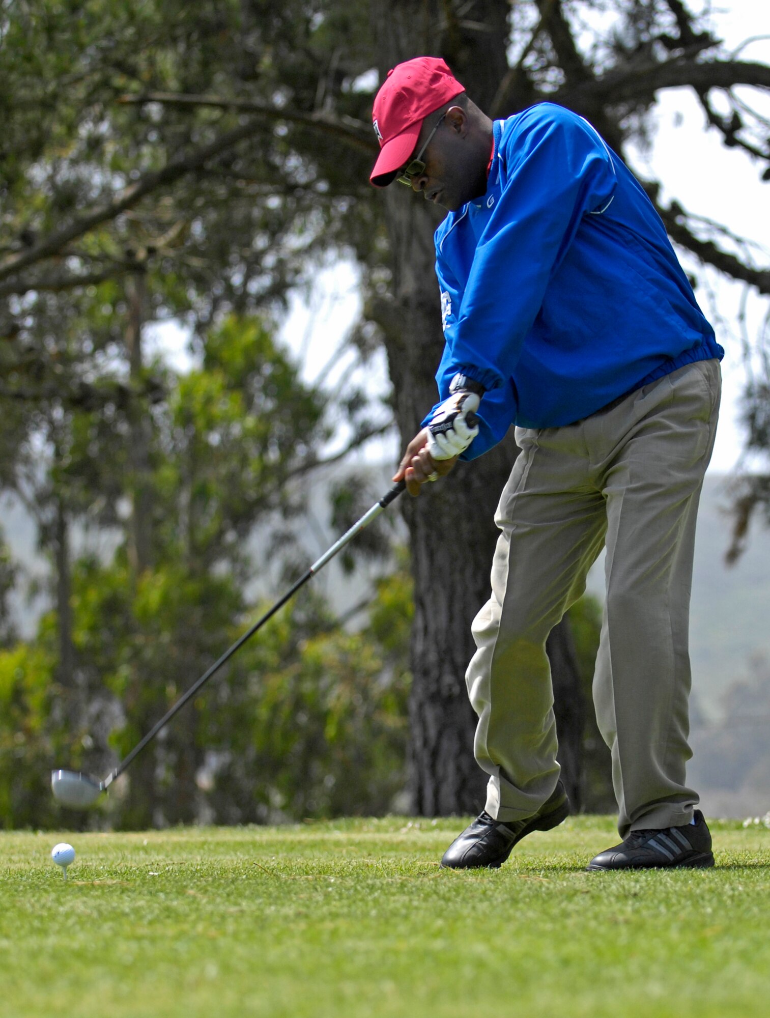 VANDENBERG AIR FORCE BASE, Calif. -- Col. Lavanson Coffey III, the 30th Launch Group commander, swings with his might at the second hole to tee off the Guardian Challenge golf tournament at the Marshallia Ranch Golf Course here Friday, April 23, 2010. (U.S. Air Force photo/Airman 1st Class Andrew Lee) 