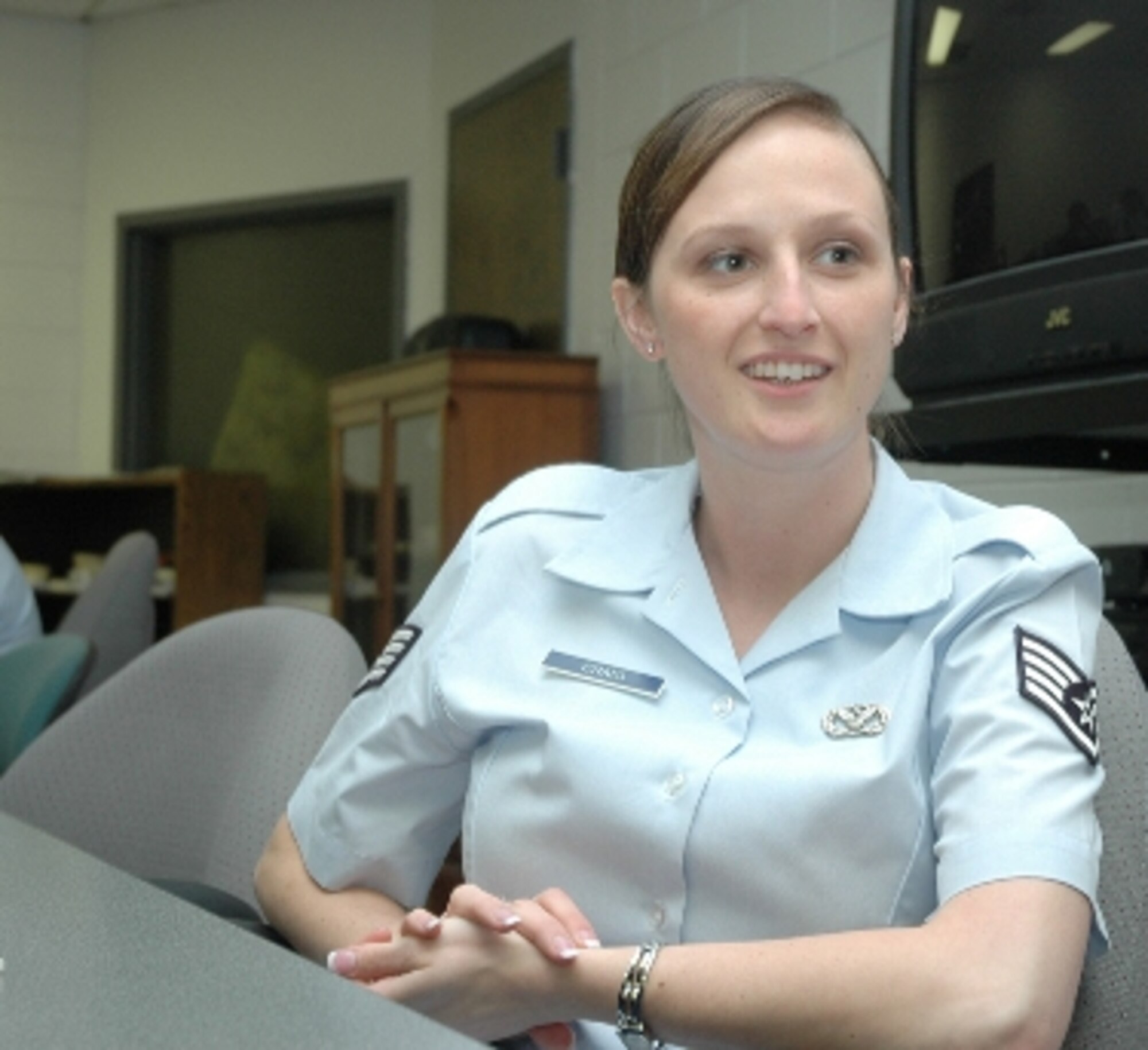 Staff Sgt. Misty Craig discusses her project in the NCO Leadership Development Course.  (U.S. Air Force photo/Travon Dennis)