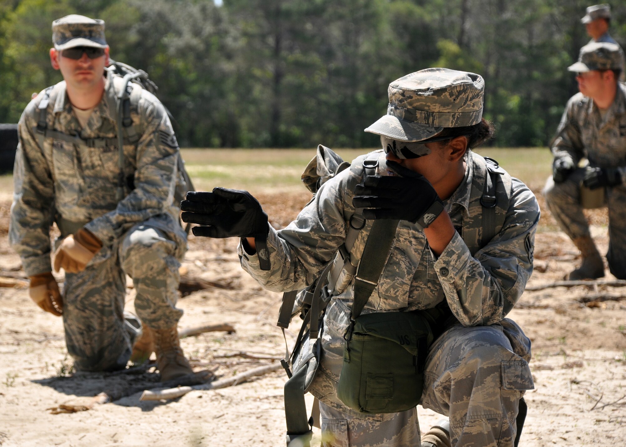 EGLIN AIR FORCE BASE, Fla. – Airmen from the 316th Security Forces Squadron (Andrews AFB, Washington D.C.) scout the perimeter while searching for improvised explosive devices during the Counter-IED portion of Brave Defenders training April 22. The team was the first to experience Counter-IED, the newest addition to the training. Brave Defenders is a 16-day program training security forces members from various bases across the country in preparation for deployment to combat zones. The course opened here in 2002 and was established by Air Force Materiel Command to satisfy security forces training requirements in an expeditionary environment. (U.S. Air Force photo/ Airman 1st Class Anthony Jennings)