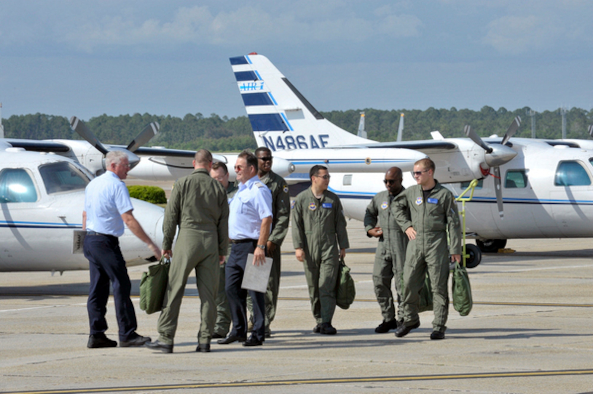 325th Air Control Squadron air battle manager students complete their first flight in a series of six, in order to earn their aeronautical wings, April 27. (U.S. AIr Force photo by Jonathan Gibson)