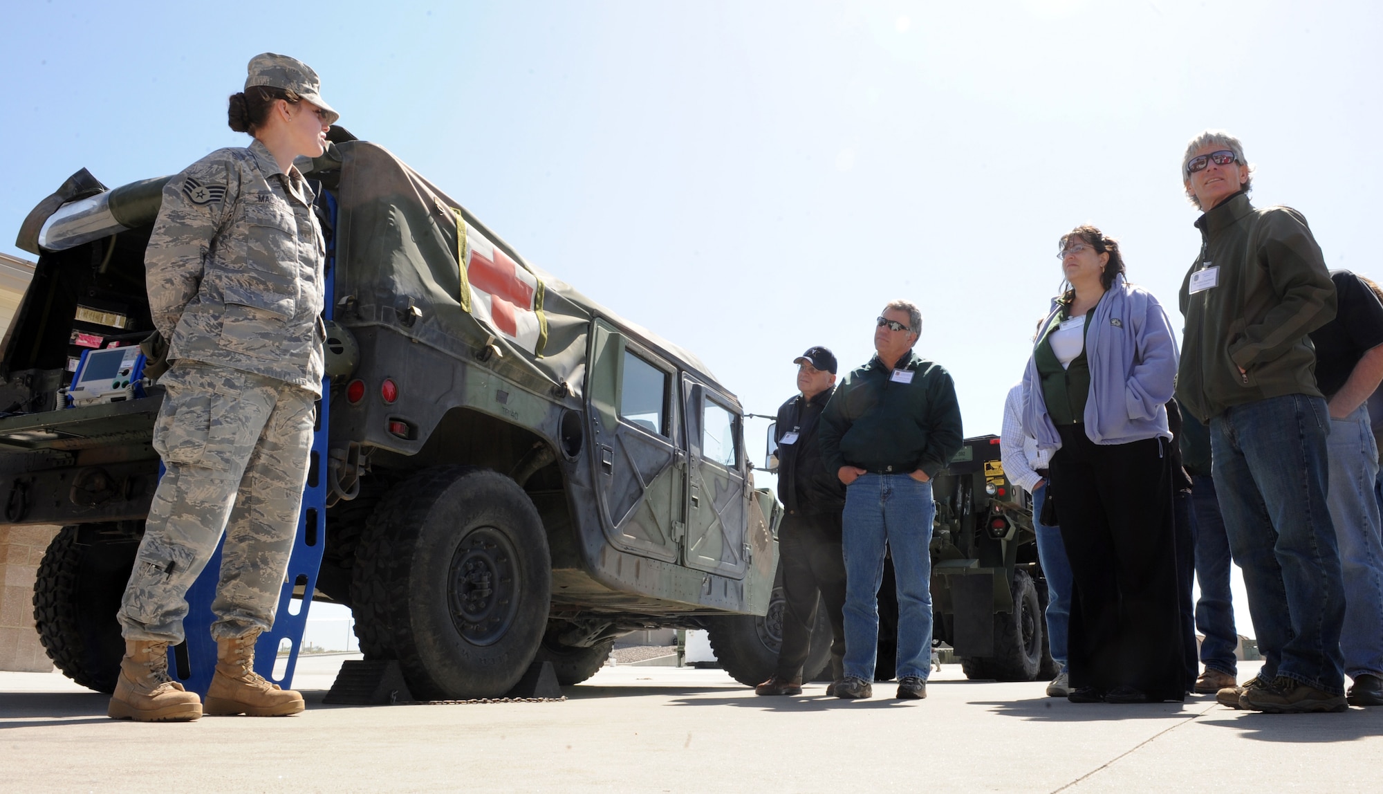 MOUNTAIN HOME AIR FORCE BASE, Idaho -- Staff Sgt. Brandi Mackey, 726th Air Control Squadron independent duty medical technician, briefs members of the Honorary Commander program during Operations Group Day April 23. The honorary commanders program is a wing-level program that pairs civic leaders with squadron, group and wing leaders to enhance the relationships between local communities and the base. It also provides a rare glimpse of life on a military installation to members of neighboring communities – many of whom have no connection to the Air Force or prior knowledge of the military. (U.S. Air Force photo by Airman 1st Class Debbie Lockhart)
