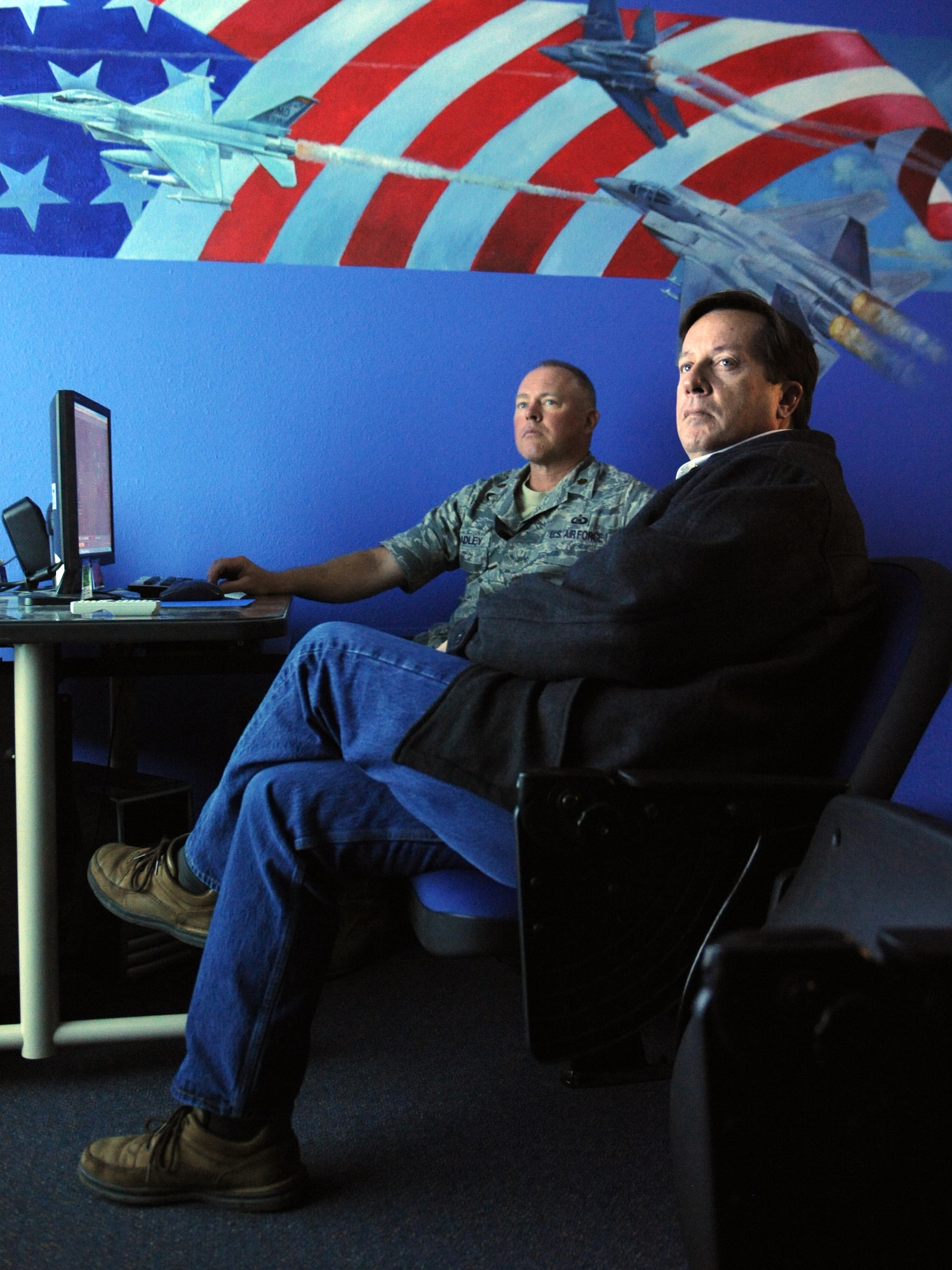 MOUNTAIN HOME AIR FORCE BASE, Idaho – Ross Parton, honorary commander, listens to a brief from the 266th Range Squadron commander during Operations Group Day April 23. The honorary commanders program is a wing-level program that pairs civic leaders with squadron, group and wing leaders to enhance the relationships between local communities and the base. It also provides a rare glimpse of life on a military installation to members of neighboring communities – many of whom have no connection to the Air Force or prior knowledge of the military. (U.S. Air Force photo by Airman 1st Class Debbie Lockhart)