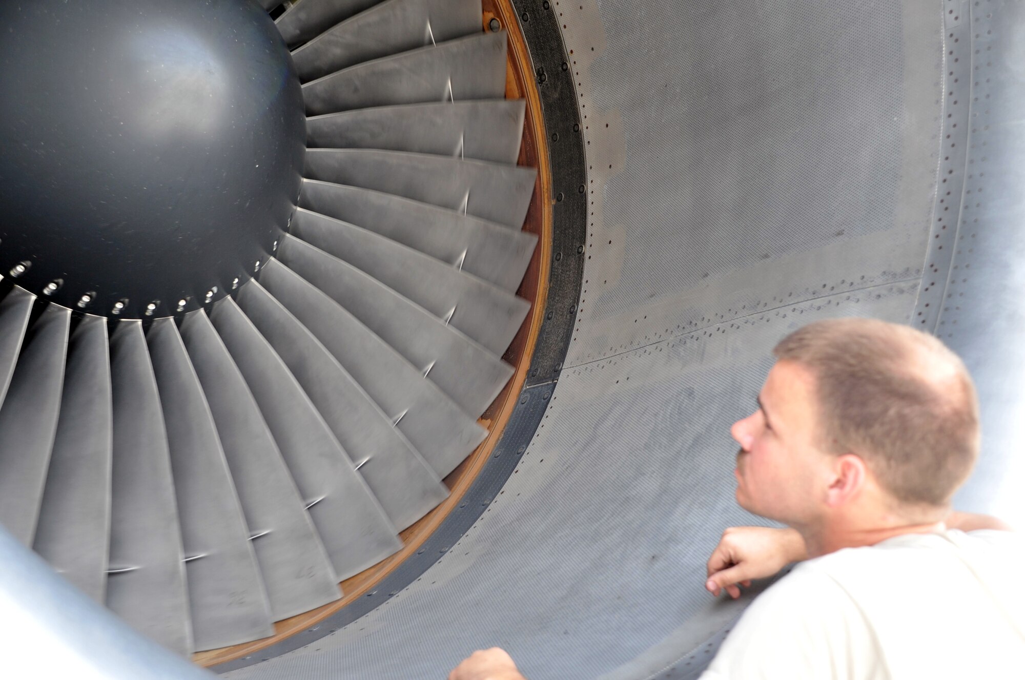 Airman 1st Class Brian Welch, KC-10 Extender crew chief with the 380th Expeditionary Aircraft Maintenance Squadron Extender aircraft maintenance unit, works on a KC-10 during operations for the 380th Air Expeditionary Wing at a non-disclosed base in Southwest Asia on April 24, 2010. Airman Welch is deployed from the 660th Aircraft Maintenance Squadron at Travis Air Force Base, Calif. (U.S. Air Force Photo/Master Sgt. Scott T. Sturkol/Released)