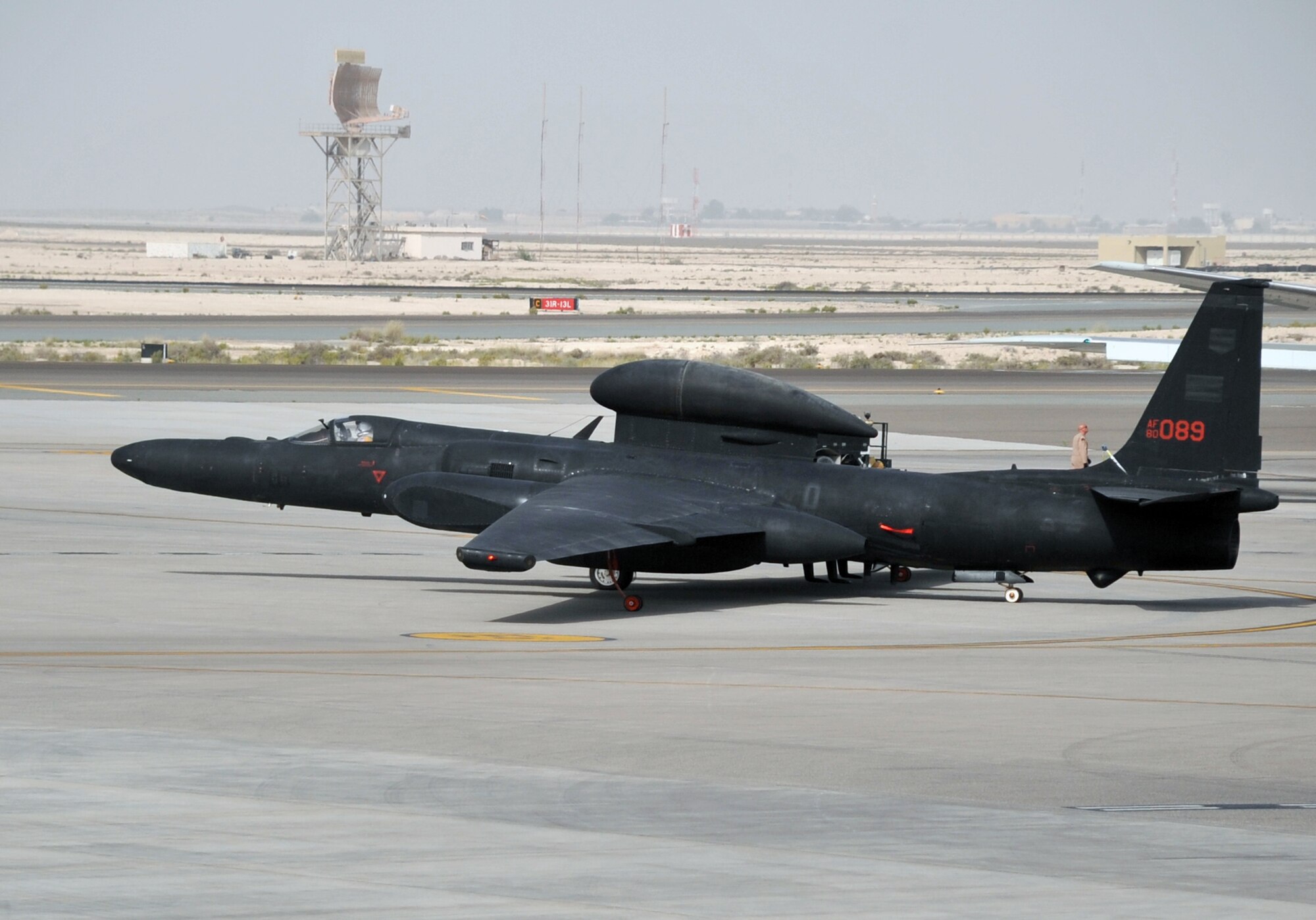 A pilot guides a U-2 Dragon Lady across the air field April 24, 2010, en route to a mission in support of operations in the U.S. Central Command area of responsibility from a non-disclosed base in Southwest Asia. The pilot and the U-2 are with the 99th Expeditionary Reconnaissance Squadron, a unit of the 380th Air Expeditionary Wing.  Through the first three months of 2010, U-2s from the 99th ERS flew nearly 200 missions in support of intelligence, surveillance and reconnaissance requirements for deployed forces supporting operations Iraqi Freedom and Enduring Freedom and the Combined Joint Task Force-Horn of Africa. (U.S. Air Force Photo/Master Sgt. Scott T. Sturkol/Released)