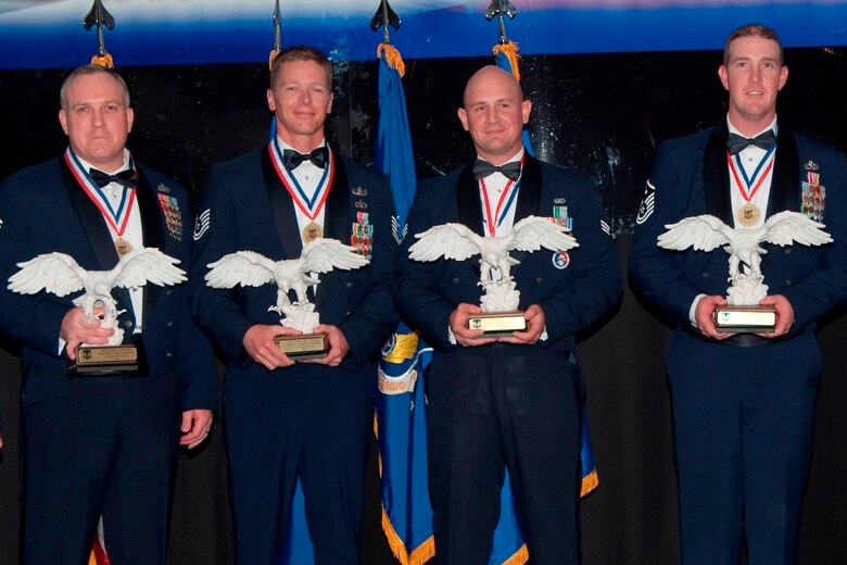 The Air Force Materiel Command's Annual Enlisted Award winners are (left to right) Master Sgt. James P. Mogren, Tinker AFB, Okla.; Tech. Sgt. Michael G. Becker, Eglin AFB, Fla.; Senior Airman Colin S. Mayo, Lackland AFB, Texas; and Master Sgt. John W. Deegan, Hill AFB, Utah. Lackland is not an AFMC base, but it is home to an AFMC unit. (U.S. Air Force photo)