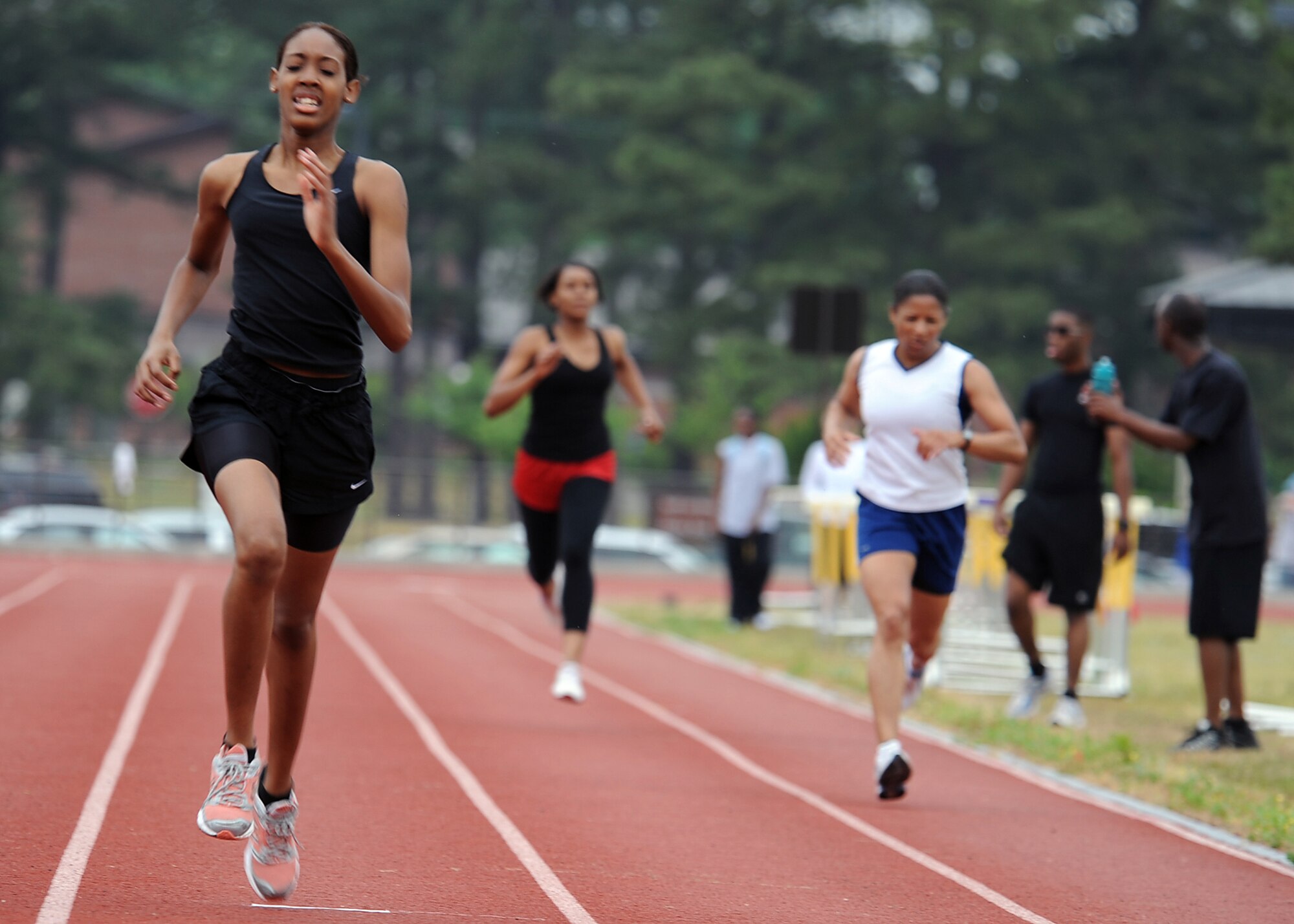 SEYMOUR JOHNSON AIR FORCE BASE, N.C. -- Airman 1st Class Latanya Tidwell sprints to the finish of a 400-meter race here, April 23, 2010. Tidwell finished in first place with a time of 1 minute, 9 seconds. There were 10 events during the spring track meet, to include 1600-meter, 800-meter, 400-meter, etc. Airman Tidwell hails from Germany. (U.S. Air Force photo/Senior Airman Whitney Lambert)