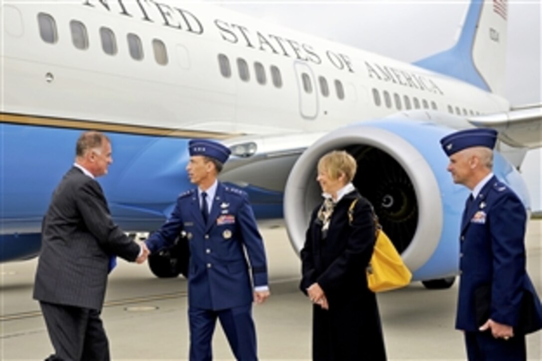 Air Force Lt. Gen. Larry D. James, commander of Air Force Space Command, greets Deputy Defense Secretary William J. Lynn III as he arrives on Vandenberg Air Force Base, Calif., April 27, 2010.