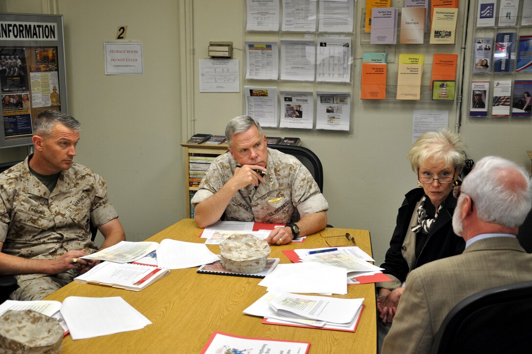 General James F. Amos, Assistant Commandant of the Marine Corps, and his wife Bonnie receive a briefing concerning the Warrior Strengthening Program from Marine and Family Services Division psychiatrist David A. Nieman April 29. The couple toured the Nebo and Yermo portions of Marine Corps Logistics Base Barstow during their visit.