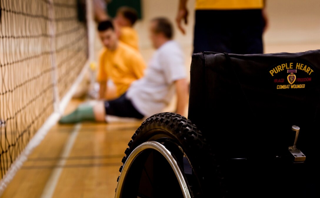 All-Marine Warrior Games Team Athletes practice sitting volleyball during the training camp, April 28, at the Base Gym. As one of the few team oriented sports in the upcoming Warrior Games May 10, athletes with varying challenges come together as one, overcoming them as a team to compete in the Warrior Games.