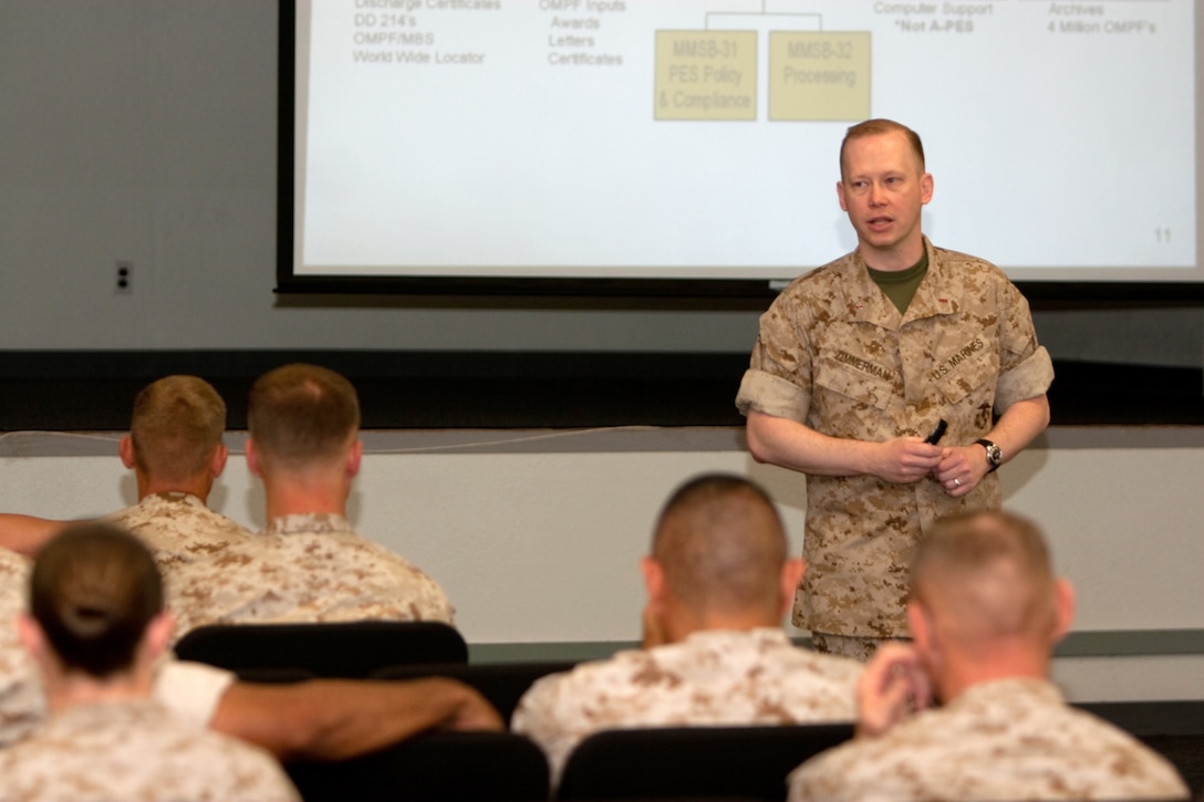 Chief Warrant Officer 4 Shelby Zimmerman, assistant head of Headquarters Marine Corps' Manpower Management Support Branch, briefs Marines from U.S. Marine Corps Forces, Pacific, regarding the Personnel Evaluation System April 29 at Camp H.M. Smith, Hawaii. Zimmerman and his colleagues gave numerous briefings regarding the Marine Corps' promotion process, how to improve odds of selection, and instructions for the system's continued fair and accurate reporting to ensure only the best Marines are promoted and retained.