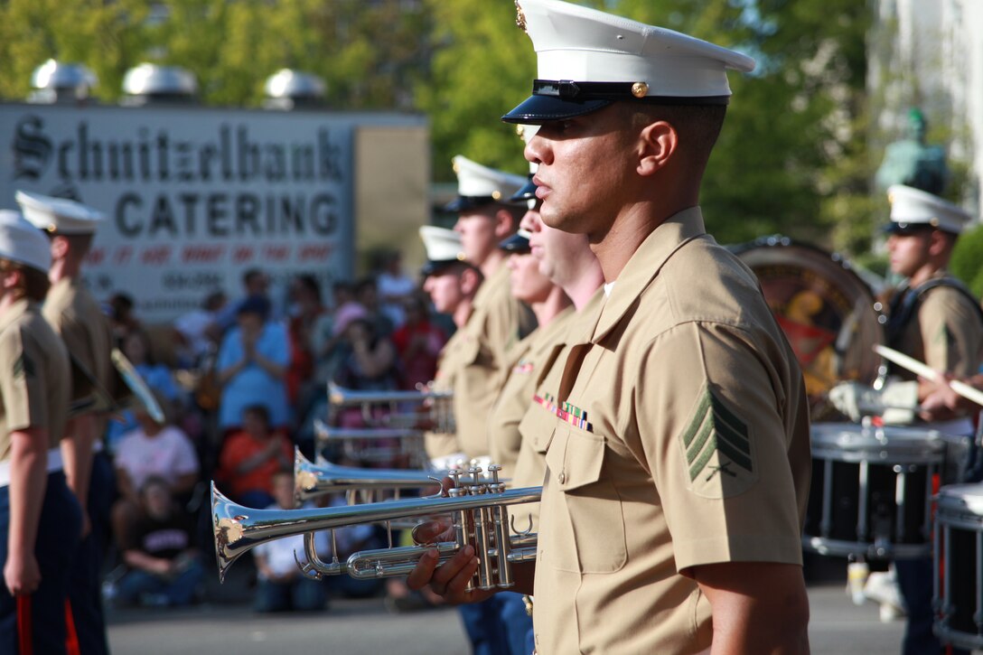 Sgt. Jerry M. Williams, a musician with the 2nd Marine Aircraft Wing Band, stands in formation and prepares to march in the 55th annual Pegasus Parade in downtown Louisville, Ky., April 29. The parade marked the final performance of the band in the Louisville region in support of festivities for the Kentucky Derby.