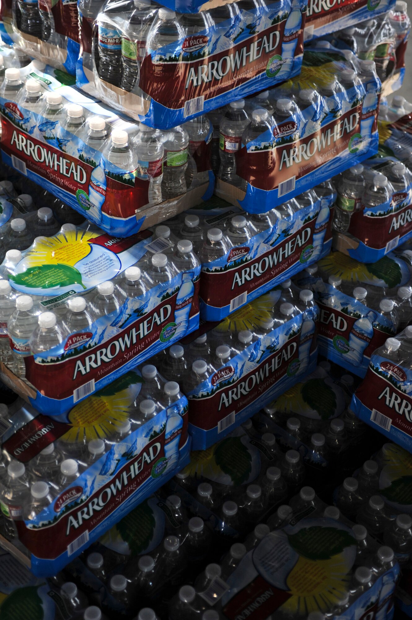 ELMENDORF AIR FORCE BASE, Alaska – Cases of water sit at Hangar 5 ready to be picked up April 29. Due to recent elevated levels of fluoride in water on Elmendorf and Fort Richardson, the base has been supplying water at Hangar 5. (Air Force photo by Airman 1st Class Christopher Gross)