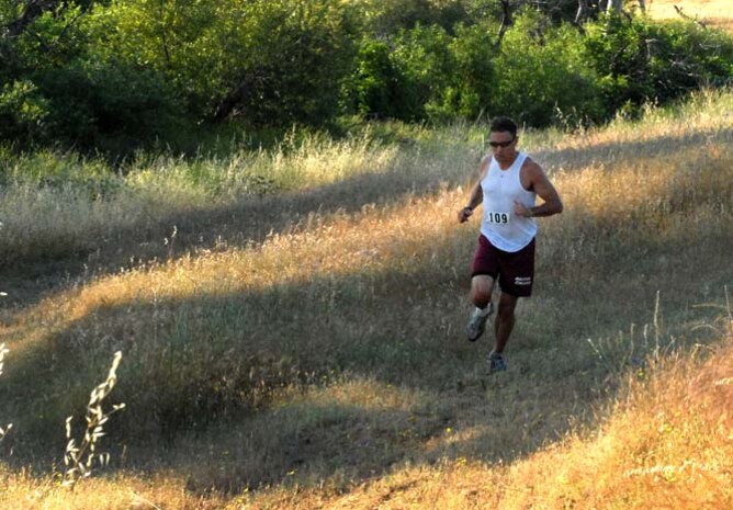 Capt. Brian Benestad competes in a Recce Challenge May 28, 2009. Captain Benestad has competed in numerous races which he uses as workouts to prepare him for marathons. (Air Force Photo by Airman 1st Class Chuck Broadway)