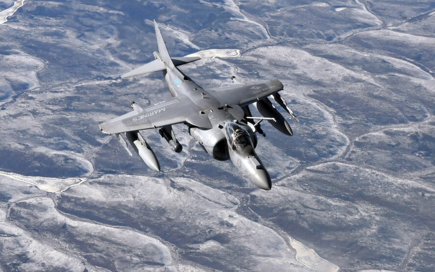 A Marine AV-8B Harrier from the VMA 211, Marine Corps Air Station, Yuma, Arizona, moves into position to receive fuel from a basket on a KC-135 Stratotanker from McConnell Air Force Base, Kansas, during Red Flag-Alaska April 21. Red Flag-Alaska is a 10-day field training exercise that provides joint offensive counter-air, interdiction, close air support and large force employment training in a simulated combat environment. (U.S. Air Force photo/Capt. Shannon Collins)