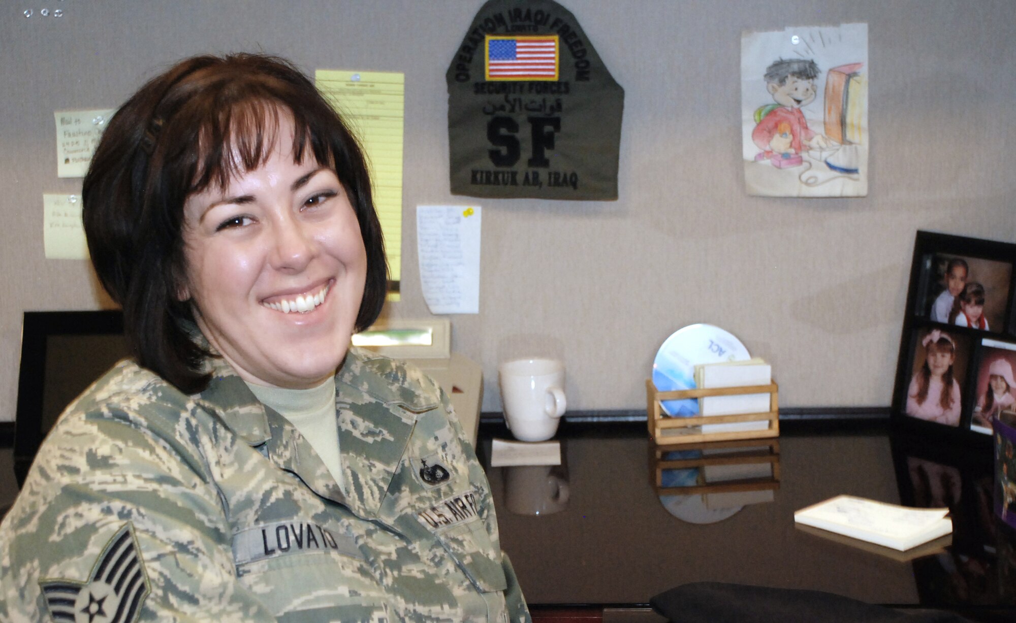 Tech. Sgt. Crystal Lovato keeps memories of her time in Iraq at her desk April 27, 2010 at Peterson Air Force Base, Colo.  Sergeant Lovato, a reservist with the 302nd Security Forces Squadron, has been invited to participate in the upcoming Warrior Games in Colorado Springs, Colo. (U.S. Air Force photo/Ann Patton)