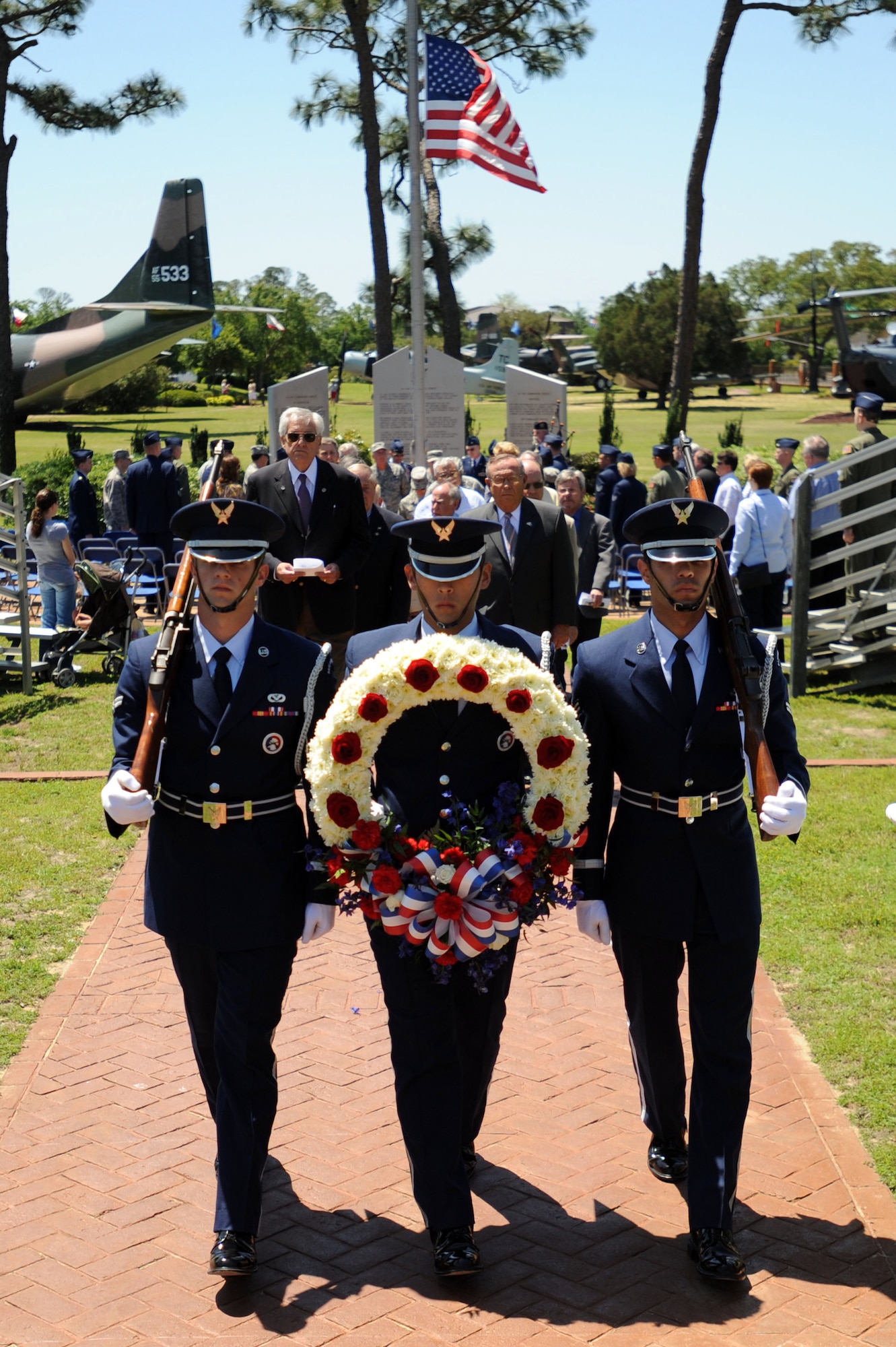 Members of the Hurlburt Honor Guard lead attendees of the Operation Eagle Claw memorial ceremony April 29. Operation Eagle Claw, conducted April 24, 1980, was a complex mission to rescue U.S. citizens taken hostage in the U.S. embassy in Iran.  Tragically, the attempt ended in the death of eight service members, including five from Hurlburt Field’s 1st Special Operations Wing. (DoD photo by U.S. Air Force Senior Airman Matthew Loken)