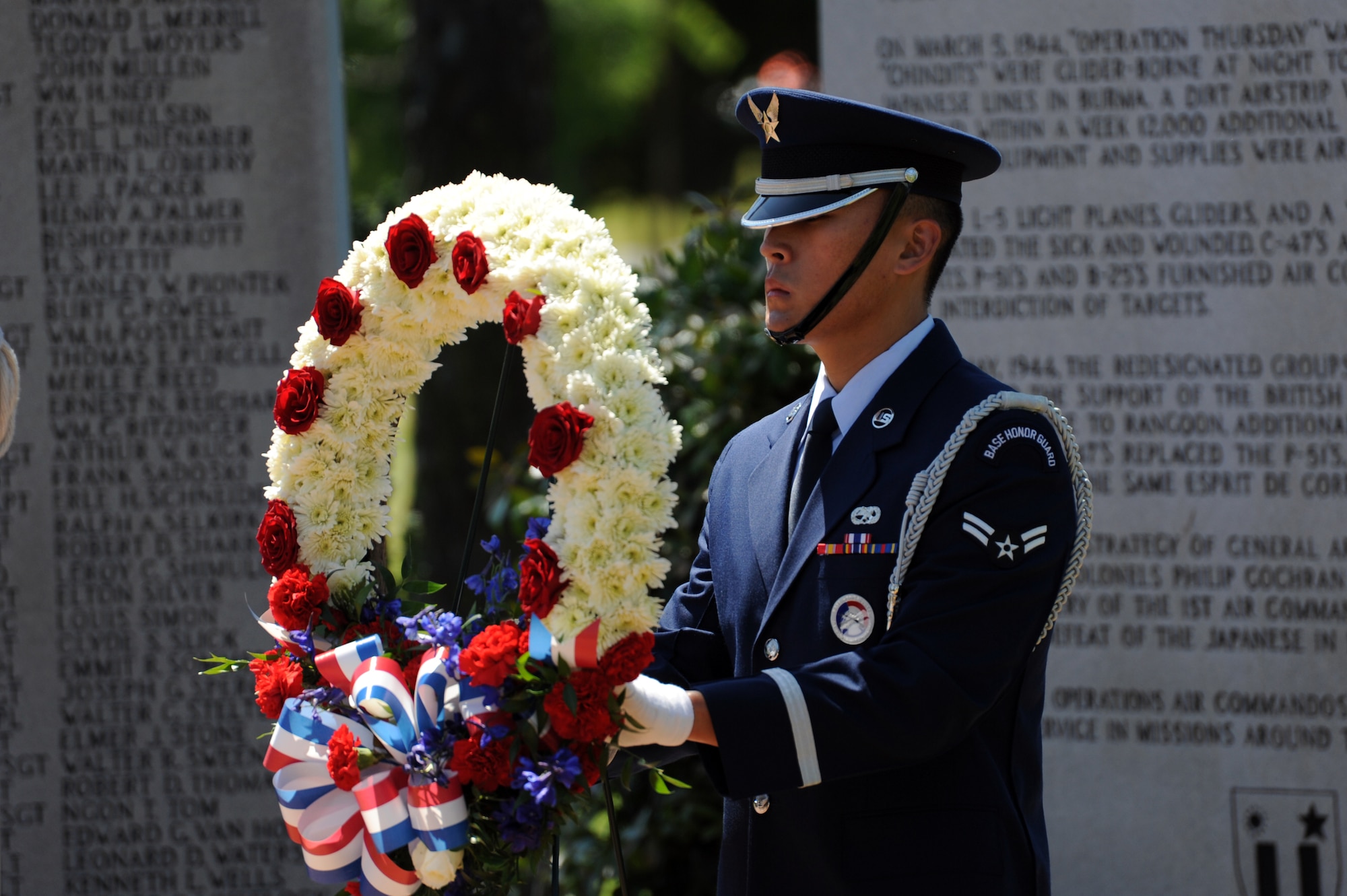 An Airman assigned to the Hurlburt Field Honor Guard team presents a wreath during a ceremony honoring the 30th anniversary of Operation Eagle Claw April 29. Operation Eagle Claw, conducted April 24, 1980, was a complex mission to rescue U.S. citizens taken hostage in the U.S. embassy in Iran.  Tragically, the attempt ended in the death of eight service members, including five from Hurlburt Field’s 1st Special Operations Wing. (DoD photo by U.S. Air Force Senior Airman Matthew Loken)