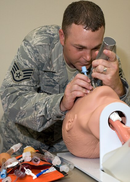 WILFORD HALL MEDICAL CENTER, Texas – Staff Sgt. Joshua Etheridge, Pediatric Advanced Life Support and Neonatal Resuscitation Program course coordinator, Wing Education and Training Division, 59th Medical Wing, Lackland Air Force Base, Texas, demonstrates intubation procedures to a class at Wilford Hall Medical Center in September 2000. The 59th Medical Wing is the Air Force's premier medical facility. The vision is providing great care: building warrior medics. The mission is improving operational capability through healthcare delivery, education, training, research and readiness. WHMC is the largest of 15 clinical training sites in the Air Force. (U.S. Air Force photo/Robert Shelley)