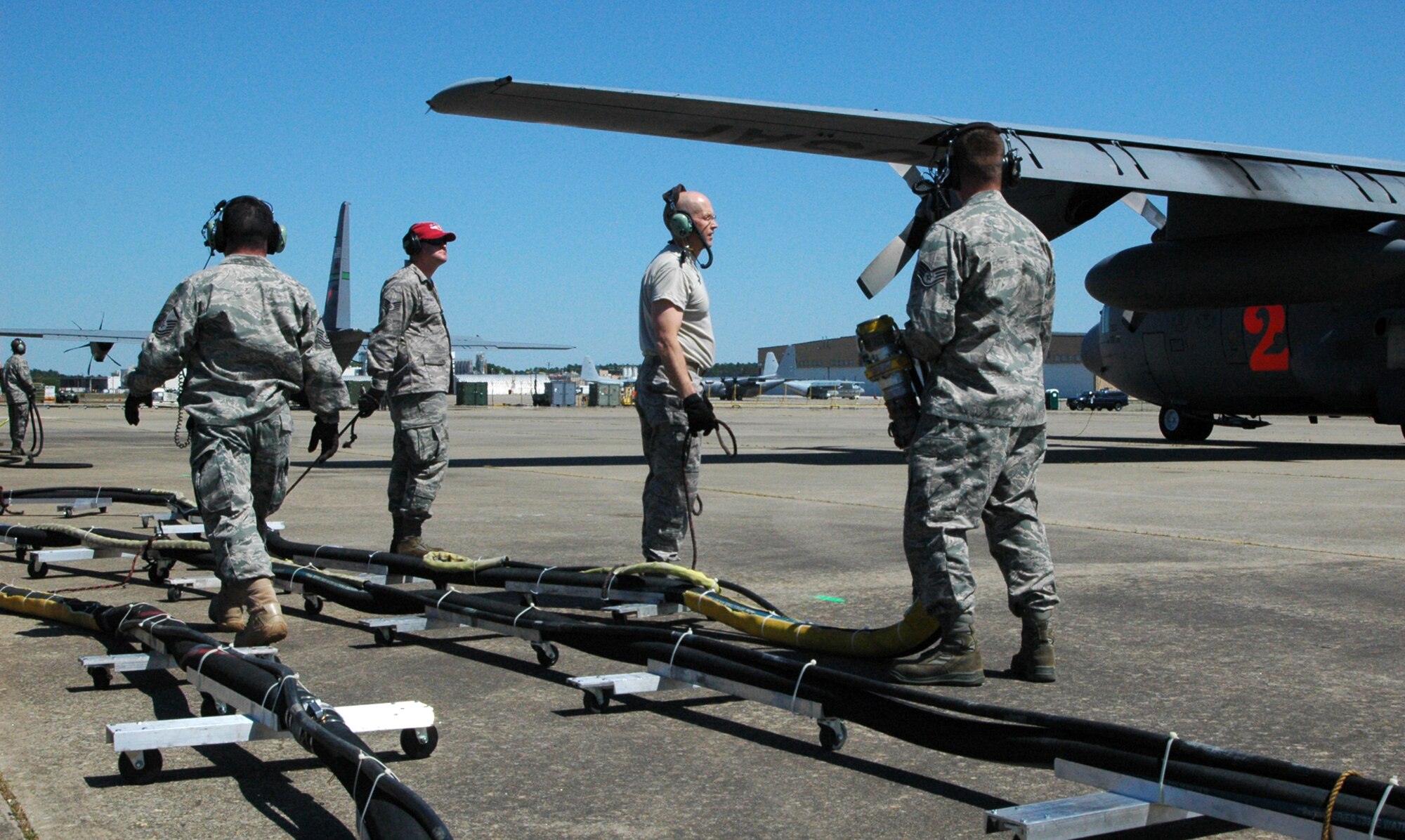 C-130 Hercules maintainers prepare to refill a Modular Airborne Fire Fighting System with pressurized water during an annual certification training April 28 during the 2010 Modular Airborne Firefighting System certification training in Greenville, S.C. The annually-held certification brought together more than 400 Air National Guard and Air Force Reserve Airmen and their unit's C-130s to receive certification from the U.S. Forest Service in aerial firefighting. The certification runs April 25-May 1. The maintenance Airmen are assigned to the Air Force Reserve's 302nd Airlift Wing. (U.S. Air Force photo/Tech. Sgt. Daniel Butterfield)