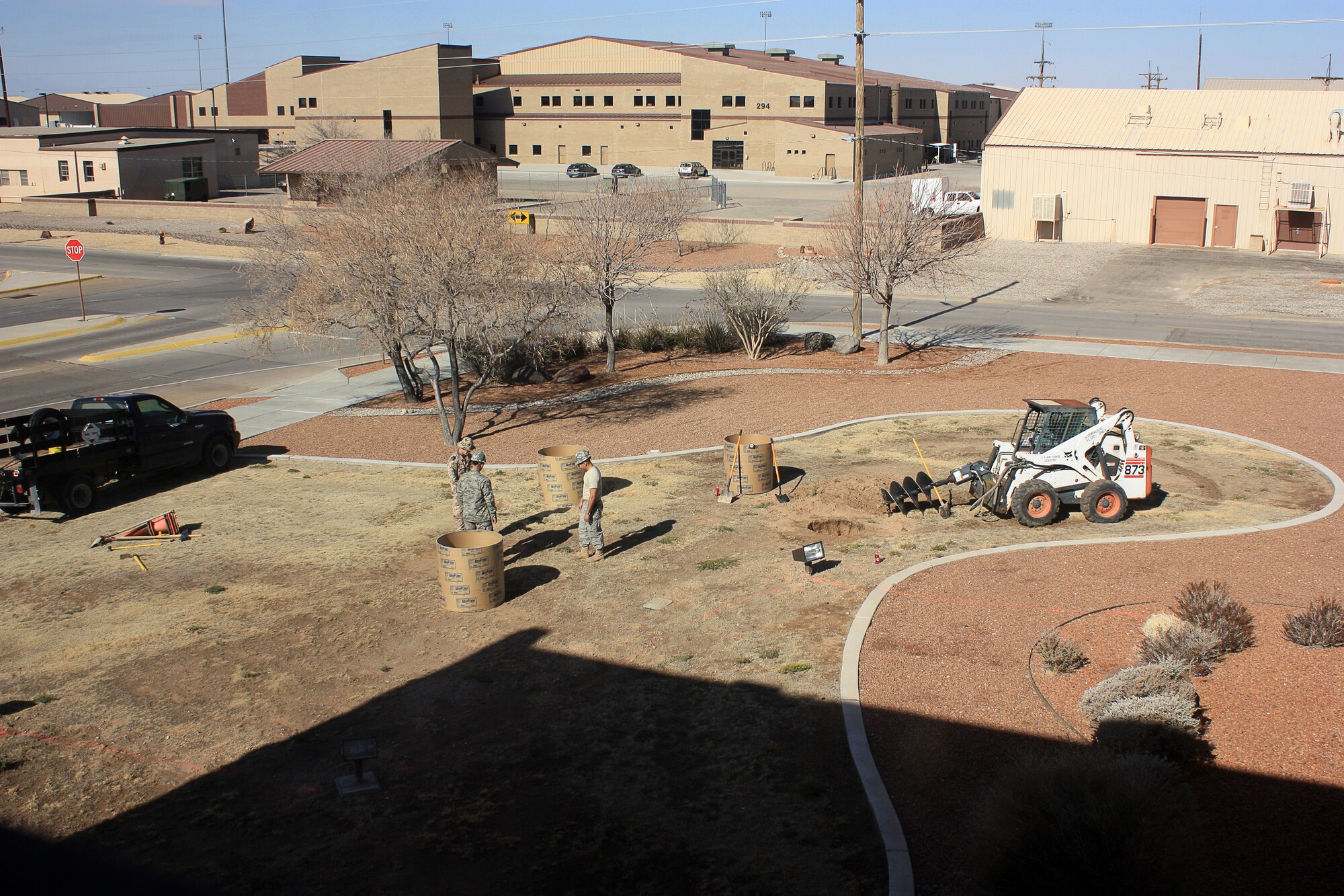 HOLLOMAN AIR FORCE BASE, N.M. -- Members of the 49th Civil Engineer Squadron prepare the grounds for where the German air force Tornado 45+11 will sit on static display Feb. 9, 2010. The aircraft was moved onto the spot April 17 and officially unveiled by Col. Frank Kiesel, German Air Force Flying Training Center commander, April 28, 2010. (German Air Force photo by Hauptgefreiter -- Airman 1st Class -- Ihno Boekhoff / Released)