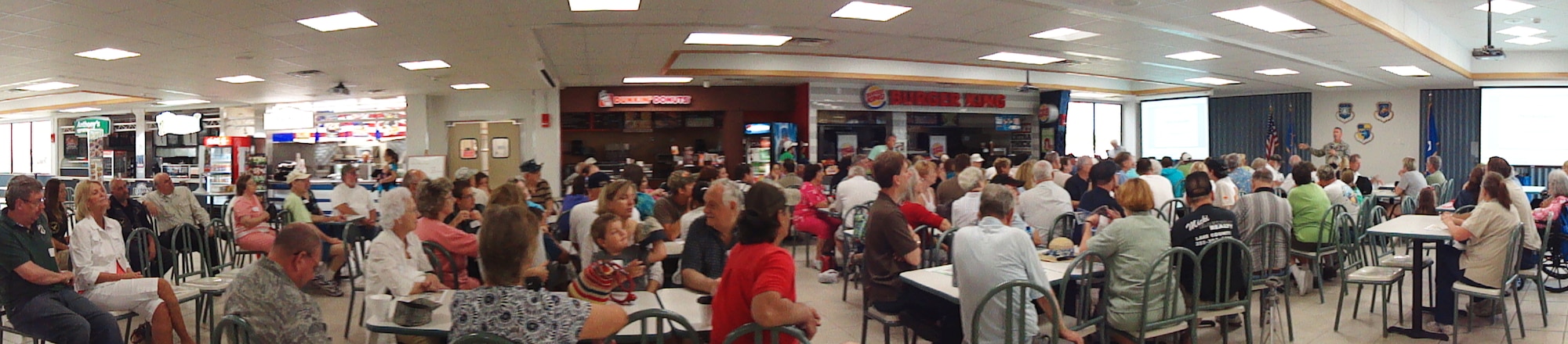 More than 150 Cape Canaveral descendents listen as 45th Space Wing Commander Col. Ed Wilson makes his opening remarks at the Descendents Reunion April 24 in the Cape Cafeteria. The reunion allows individuals who lived on Cape Canaveral an opportunity to return and visit with one another. (U.S. Air Force photo/Nancy Watts)