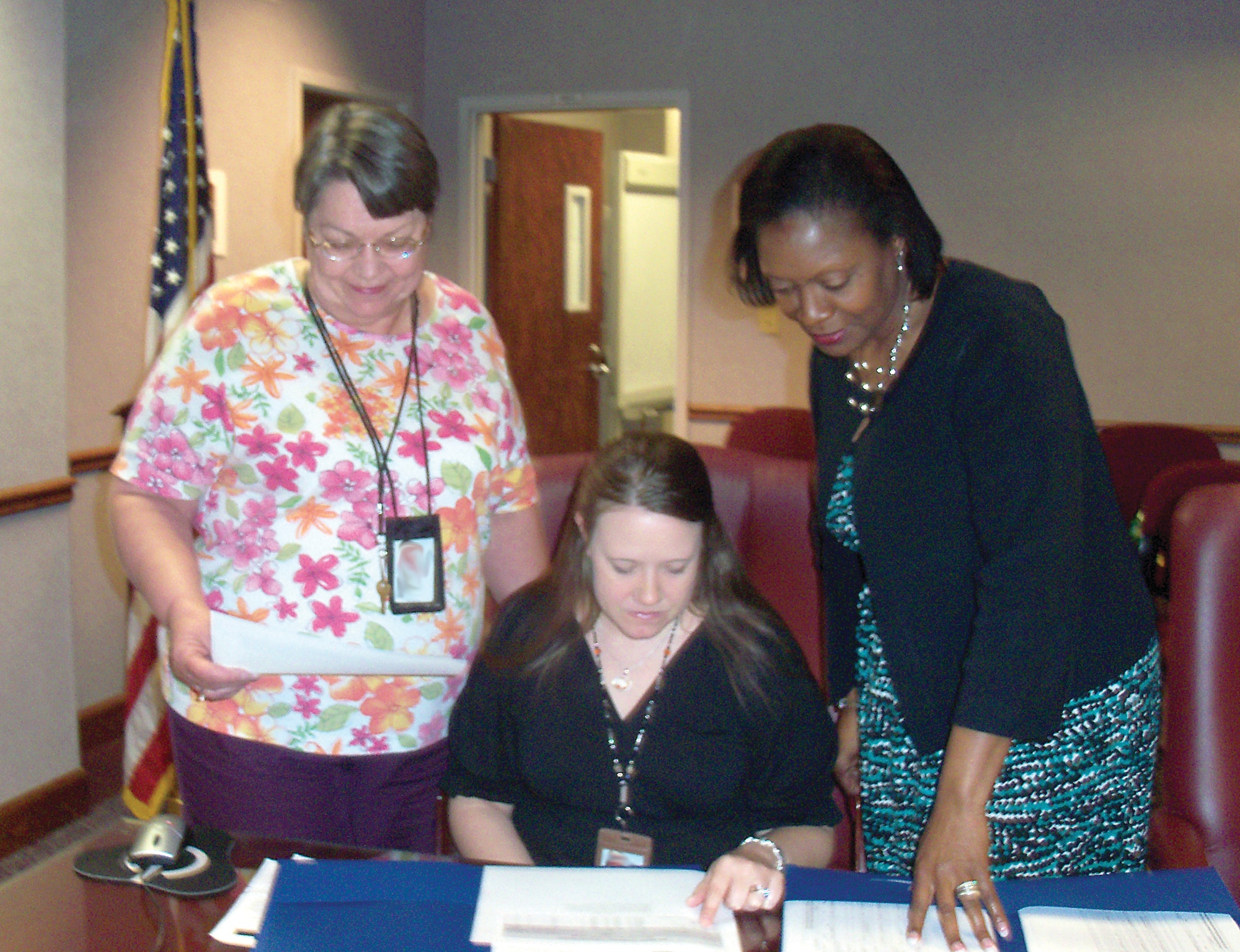Debra Peters, Laura Smith and Latisha Falana, from left, are forward demand planners of the 406th Supply Chain Management Squadron at Robins Air Force Base, Ga. They validate multiple users of Defense Logistics Agency-managed consumable parts, ensuring all user needs are accurate before submitting the final consumable demand plan to DLA. (Courtesy photo)