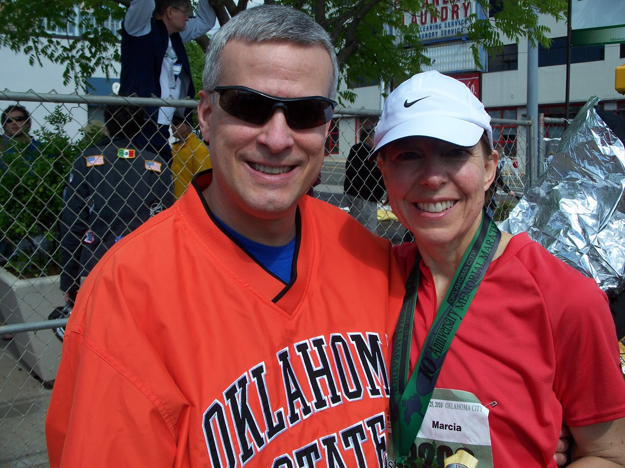 Marcia Walker is greeted by her husband, Steve, after finishing the Oklahoma City Memorial Marathon April 25. Running her first marathon, the colonel, who is the senior individual mobilization augmentee to the 327th Aircraft Sustainment Wing commander, crossed the finish line just one minute slower than her target time of four hours. Steve Walker is a member of the 427th Aircraft Sustainment Group. (Courtesy photo)
