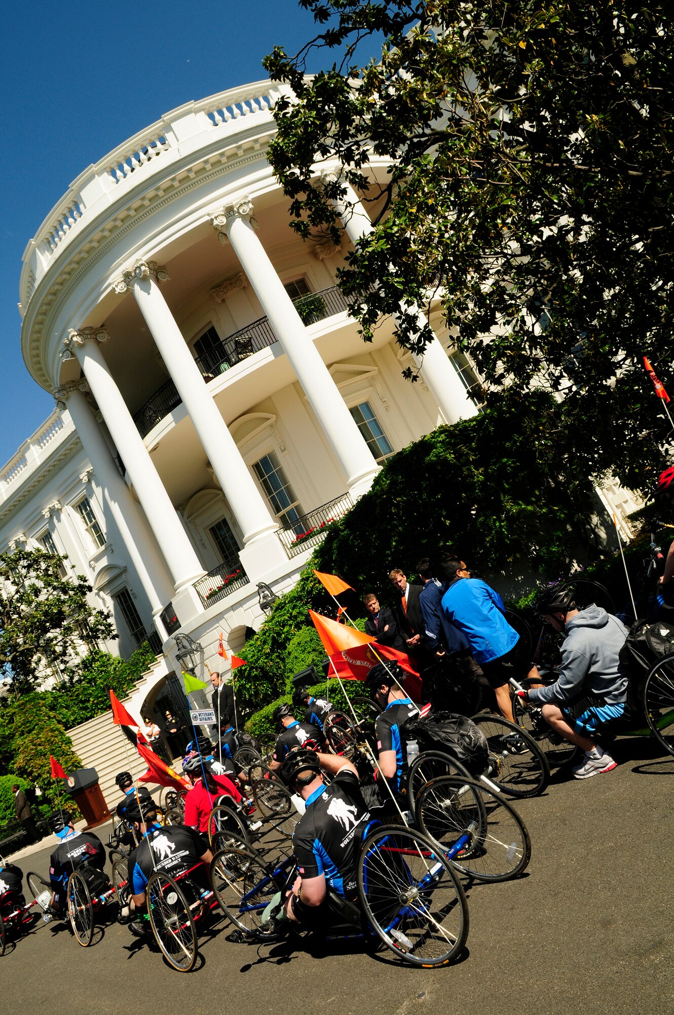 Wounded Warriors gather on the starting line at the 4th Annual Whitehouse to Lighthouse Wounded Warrior Soldier Ride April 28. The three-day bicycle, hand-bicycle and wheelchair ride began at the White House and ends Saturday at the U.S. Naval Academy in Annapolis, Md. (U.S. Air Force photo by Airman 1st Class Katherine Windish) 