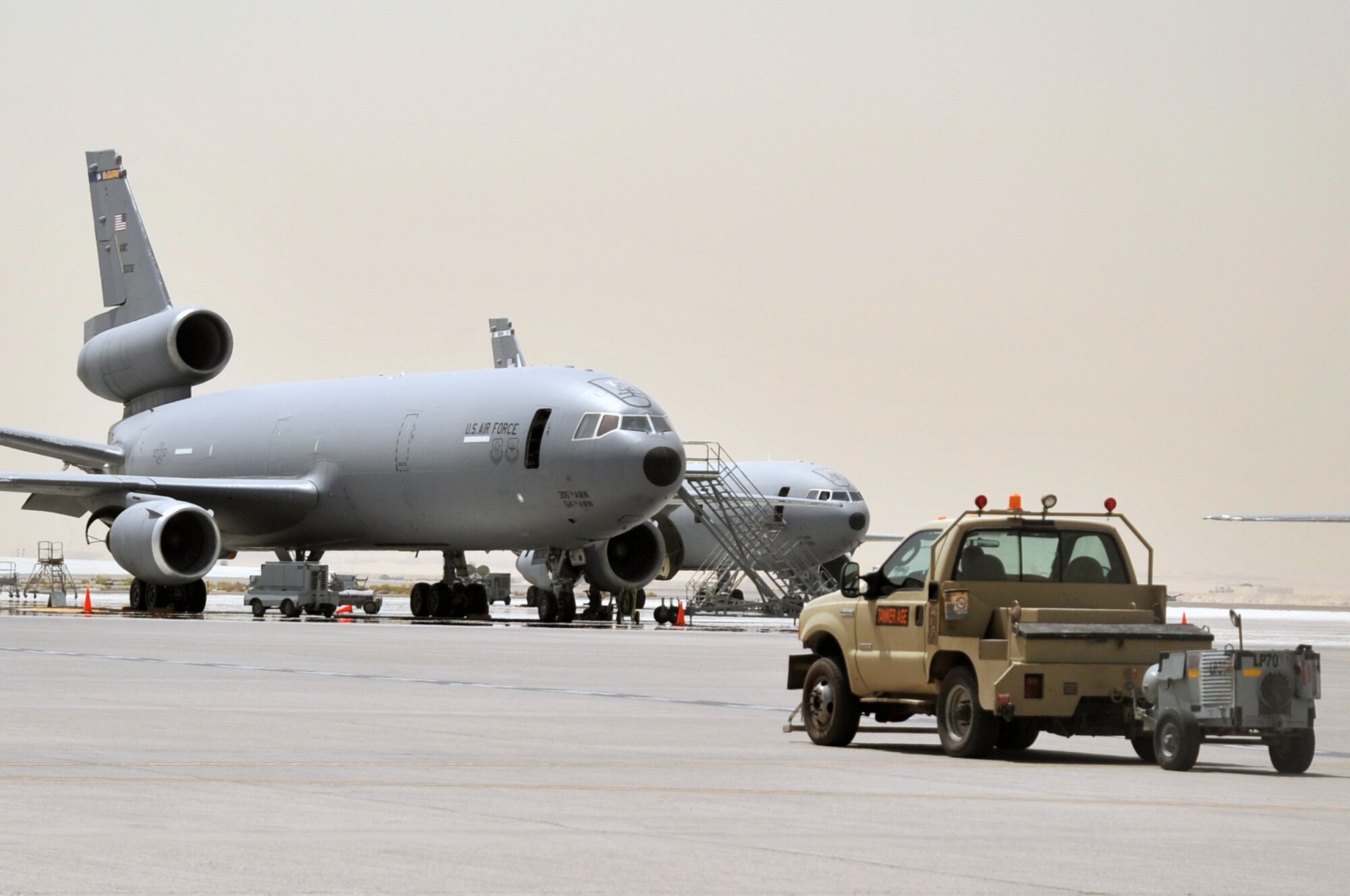 Maintenance Airmen from the 380th Expeditionary Aircraft Maintenance Squadron Extender aircraft maintenance unit work on a KC-10 Extender during maintenance operations for the 380th Air Expeditionary Wing at a non-disclosed base in Southwest Asia on April 27, 2010. KC-10s and the maintenance Airmen who support them deployed to the 380th AEW are a part of the 908th Expeditionary Air Refueling Squadron and are deployed from Joint Base McGuire-Dix-Lakehurst, N.J., and Travis Air Force Base, Calif. (U.S. Air Force Photo/Master Sgt. Scott T. Sturkol/Released)