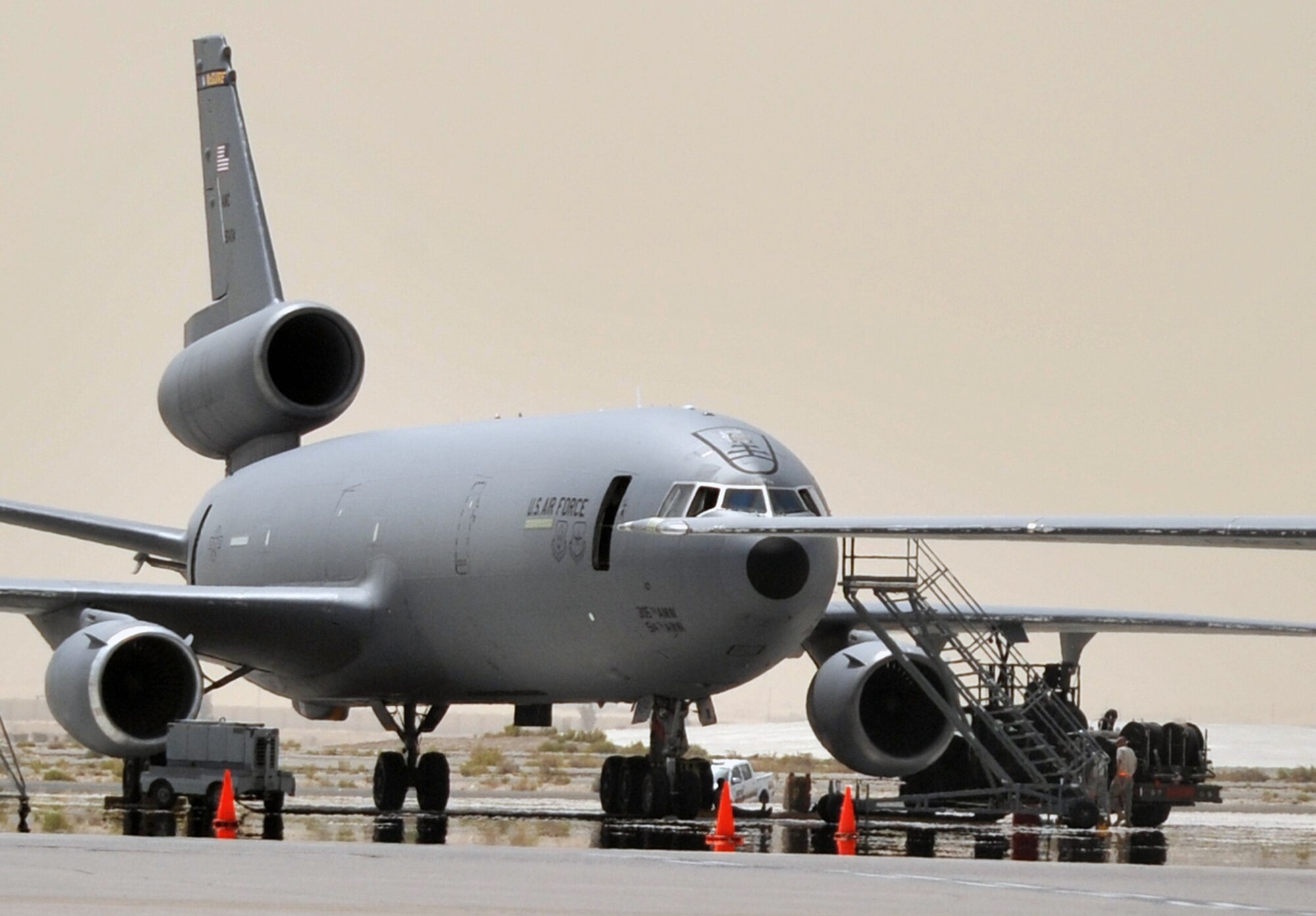 Maintenance Airmen from the 380th Expeditionary Aircraft Maintenance Squadron Extender aircraft maintenance unit work on a KC-10 Extender during maintenance operations for the 380th Air Expeditionary Wing at a non-disclosed base in Southwest Asia on April 27, 2010. KC-10s and the maintenance Airmen who support them deployed to the 380th AEW are a part of the 908th Expeditionary Air Refueling Squadron and are deployed from Joint Base McGuire-Dix-Lakehurst, N.J., and Travis Air Force Base, Calif. (U.S. Air Force Photo/Master Sgt. Scott T. Sturkol/Released)