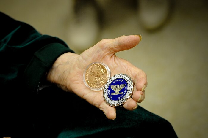 Dorothy Ebersbach, Women Airforce Service Piliots (WASP) pilot, displays the Congressional Gold Medal Coin and the 6th Air Mobility Wing Commanders Coin after her Congressional Gold Medal ceremony in Tampa, Fl, April 28, 2010. The Congressional Gold Medal is the highest and most distinguished award Congress can award to a civilian. The WASP program was established during World War II, and from 1942 to 1943, more than 1,000 women joined, flying 60 million miles of noncombat military missions.
(U.S. Air Force photo by Staff Sgt. Joseph L. Swafford Jr.)