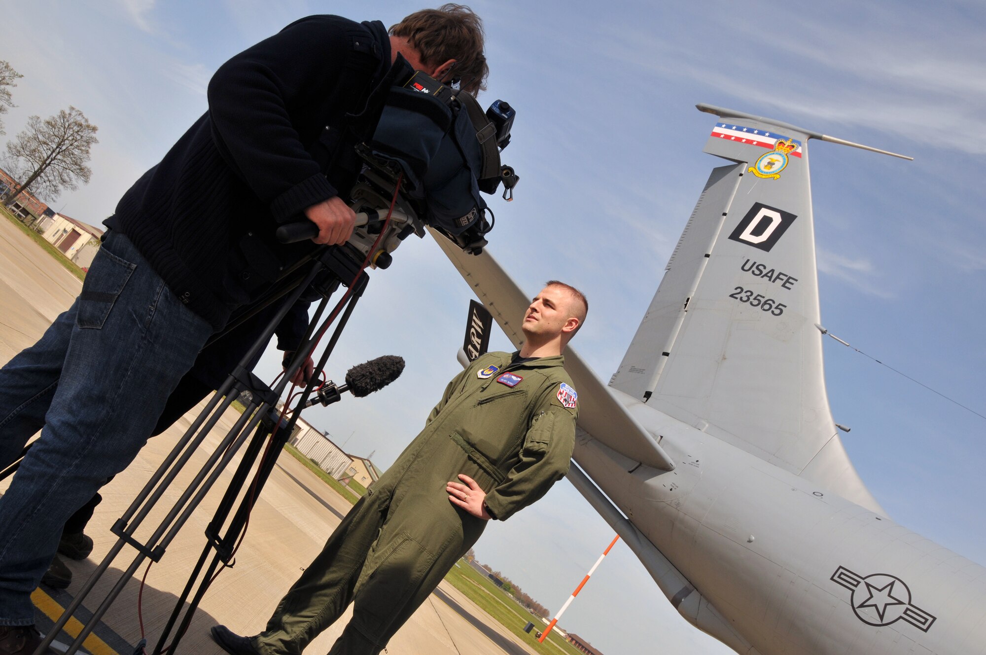 RAF MILDENHALL, England - Senior Airman Neil Patras, 351st Air Refueling Squadron boom operator, is interviewed by a local television crew here after flying them during a real-world air-to-air refueling mission over the coast of England April 27. In addition to supporting 100th Air Refueling Wing and 48th Fighter Wing training requirements, this mission also supported the 100th ARW Public Affairs Media Flight Program which allows reporters to get a detailed look at the heart of the base mission and enable them to make balanced decisions in the course of their community work. (U.S. Air Force photo/Tech. Sgt. Kevin Wallace)