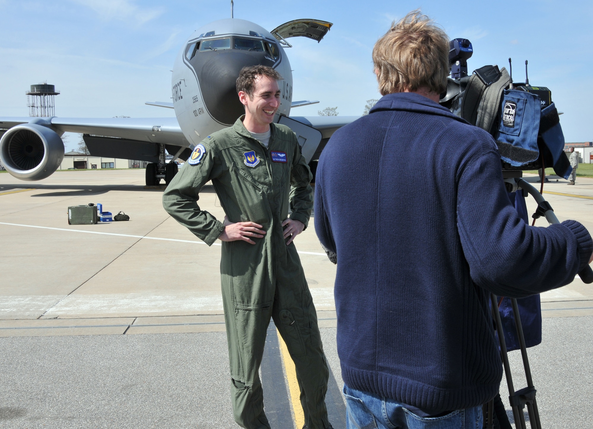 RAF MILDENHALL, England - 1st Lt. Matthew Greenspan, 351st Air Refueling Squadron pilot, is interviewed by a local television crew here after flying them during a real-world air-to-air refueling mission over the coast of England April 27. In addition to supporting 100th Air Refueling Wing and 48th Fighter Wing training requirements, this mission also supported the 100th ARW Public Affairs Media Flight Program which allows reporters to get a detailed look at the heart of the base mission and enable them to make balanced decisions in the course of their community work. (U.S. Air Force photo/Tech. Sgt. Kevin Wallace)