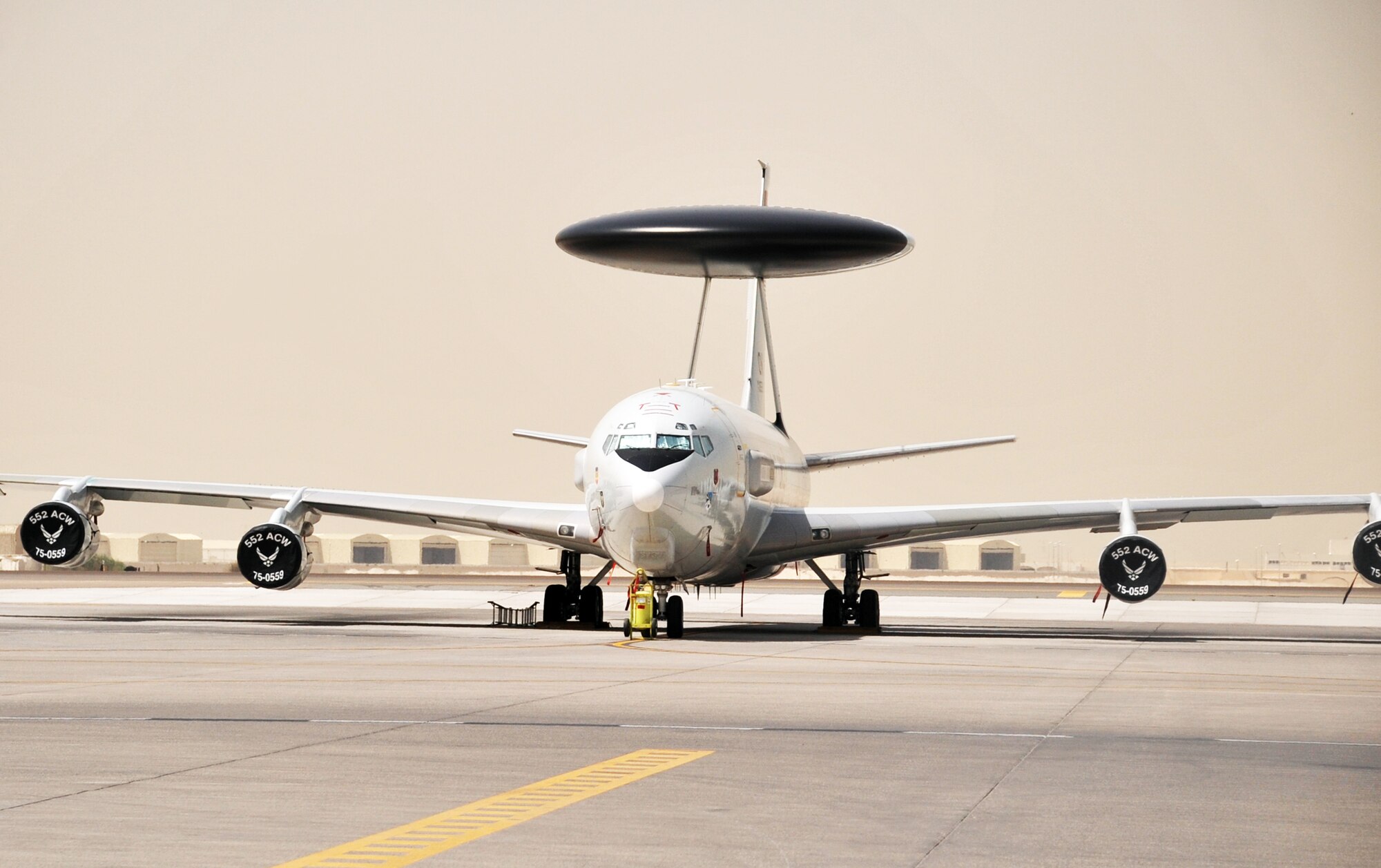An E-3 Sentry Airborne Warning and Control System aircraft is parked on the flightline for the 380th Air Expeditionary Wing operations area at a non-disclosed base in Southwest Asia on April 27, 2010. The deployed E-3 Sentry aircraft are assigned with the 965th Expeditionary Airborne Air Control Squadron and are deployed from Tinker Air Force Base, Okla. In the first three months of 2010, E-3 Sentry aircraft with the 380th Air Expeditionary Wing have flown more than 100 combat missions and handled more than 5,000 aircraft in air battle management for combat operations. (U.S. Air Force Photo/Master Sgt. Scott T. Sturkol/Released)
