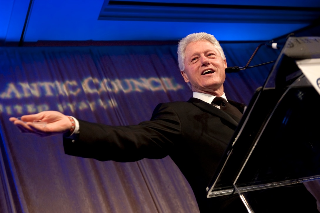 Former President Bill Clinton addresses the audience after receiving the Distinguished International Leadership Award at the annual Atlantic Council Awards Gala in Washington, D.C., April 26, 2010.