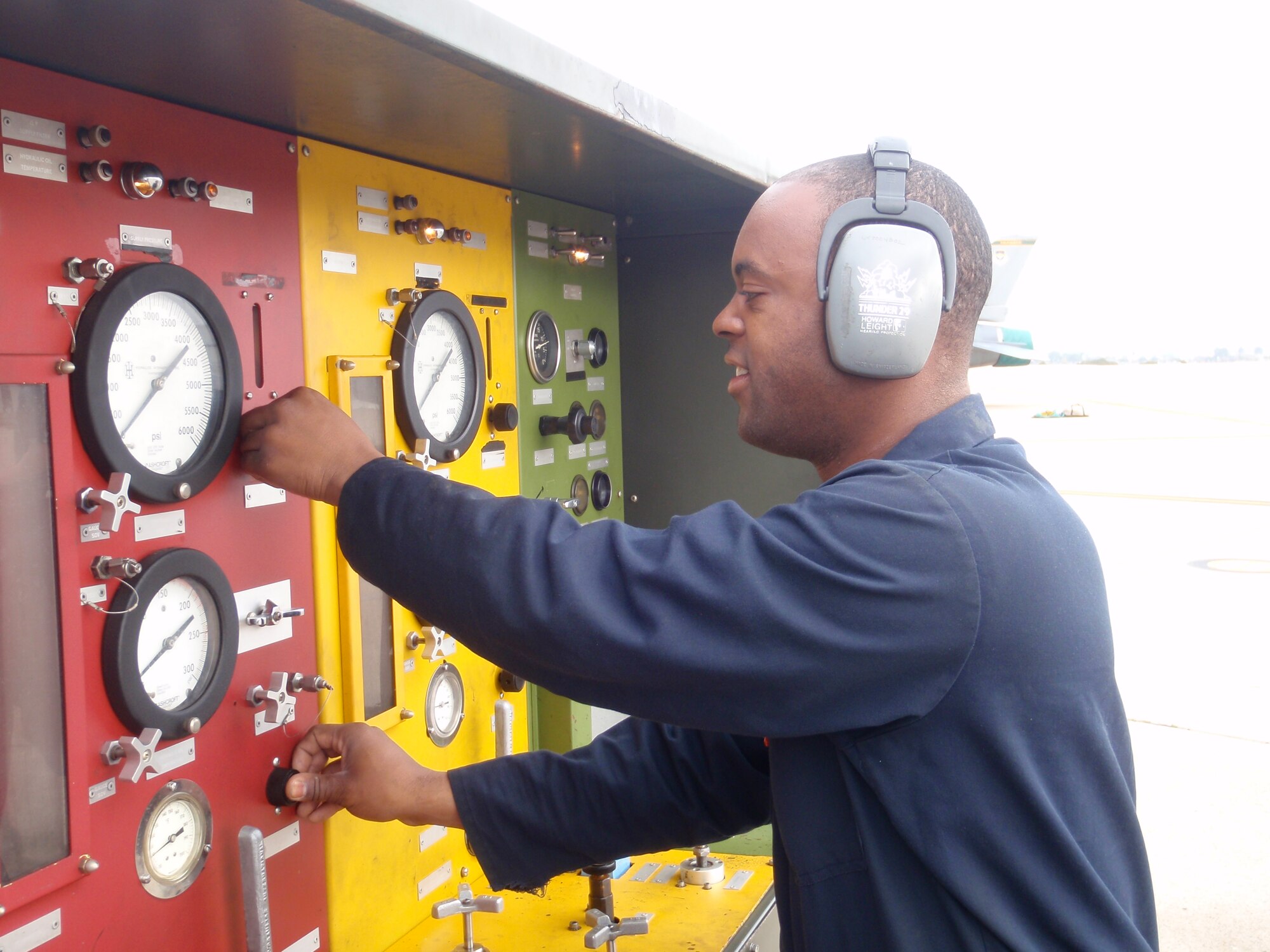 Staff Sgt. Tim Tate, 310th Aircraft Maintenance Unit crew chief, warms up a hydraulic test stand in preparation to repair a hydraulic leak on a Luke Air Force Base F-16 deployed to Naval Air Station North Island, Calif., April 9 through 19 for a joint exercise with the U.S. Marine Corps.