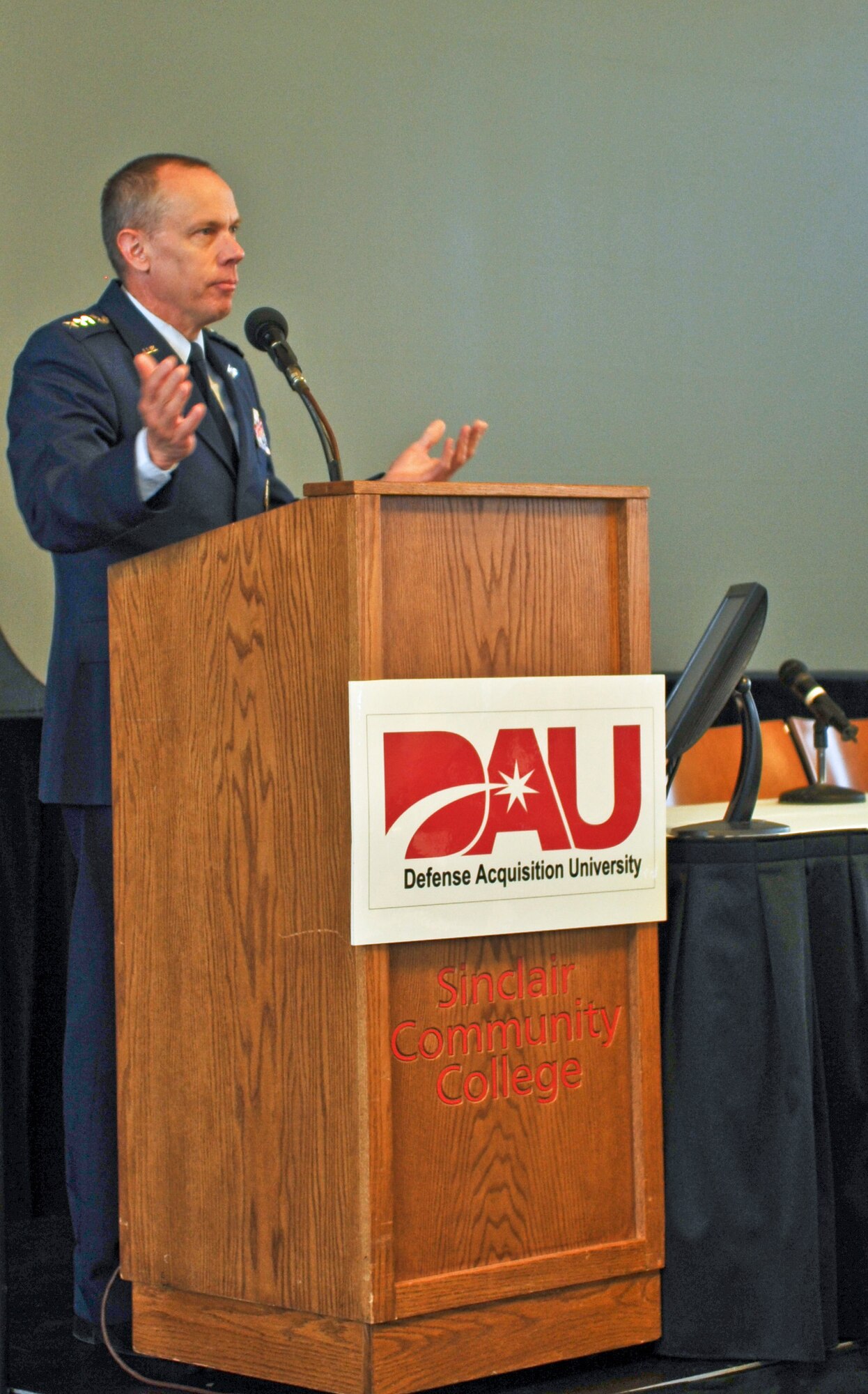 Gen. Donald Hoffman speaks to attendees of the DOD Acquisition Insight Conference April 20 at Sinclair Community College in Dayton, Ohio. The conference, sponsored by Defense Acquisition University, focused on challenges faced by the Department of Defense acquisition workforce. General Hoffman is commander of the Air Force Materiel Command at Wright-Patterson Air Force Base, Ohio.  (Defense Department photo/Erica Kobren)