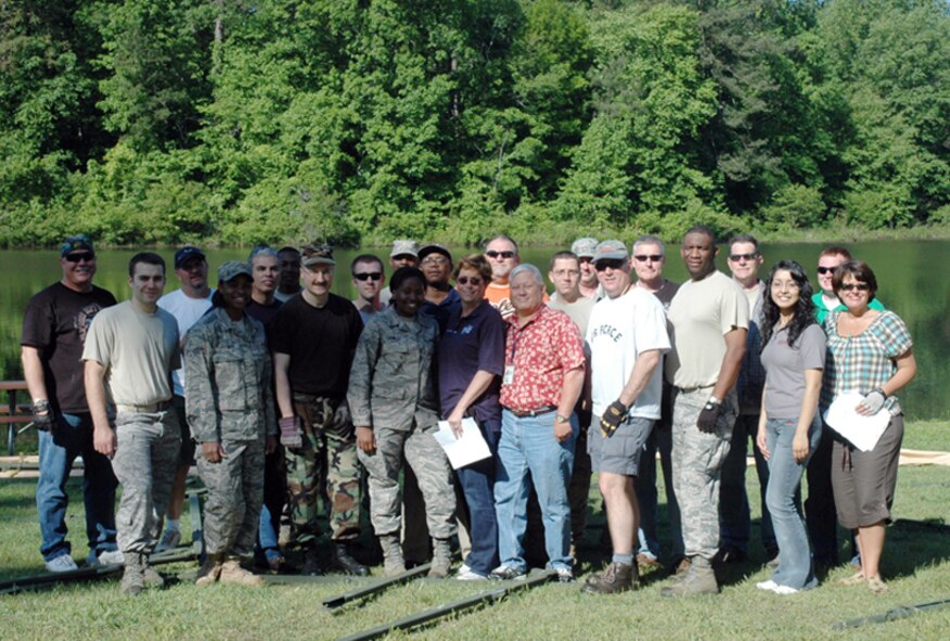 Members from the 94th Airlift Wing volunteered their time and skills to set up for the 2010 Wing Family Day , which will be held May 1, starting at 11 a.m. at the Lakeside Recreation Facility, Building 537, softball field and surrounding park area. “There’s a lot of behind-the-scenes activity that goes into events such as this.” said Chief Master Sgt. Lester Davy, 22nd Air Force and member of the Dobbins Chiefs’ Group. “Family Day would not be a success without our volunteers. (U.S. Air Force photo/Travon Dennis)