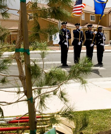NELLIS AIR FORCE BASE, Nev. -- The Nellis Air Force Base Honor Guard presents the colors before the Tree City USA Arbor Day ceremony, at The Landings at Nellis, April 29, 2010. Nellis has won the Tree City USA award for the past 16 years. The Tree City USA program provides direction, technical assistance, public attention, and national recognition for urban and community forestry programs throughout the United States.
(U.S. Air Force Photo / Airman 1st Class Jamie Nicley)